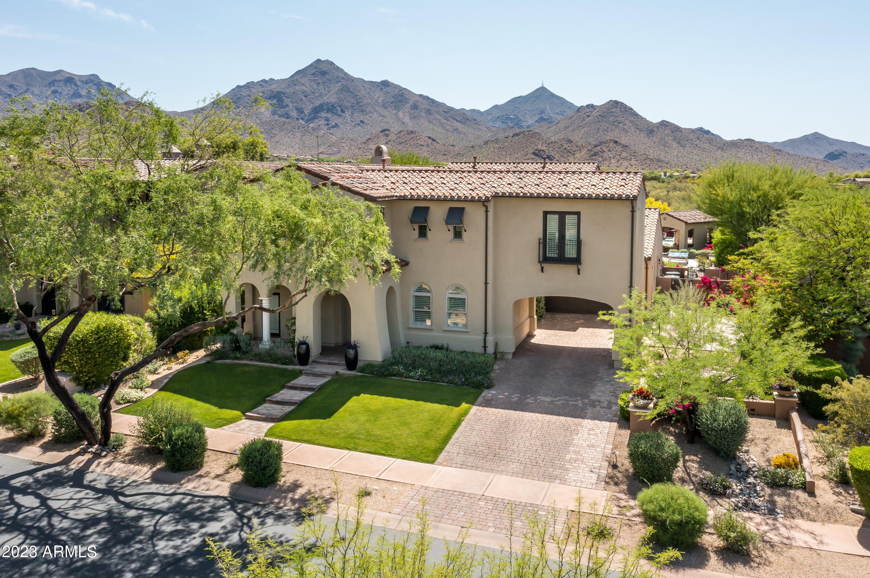 Don't miss this rare opportunity to own in one of the most sought after enclaves within the DC Ranch community, The Haciendas. This stunning home sits on one of the larger lots in the neighborhood and experiences unobstructed McDowell Mountain views from the expansive and breathtaking backyard. There is nothing missing in this completely updated 4,435 SF home, with an open great room plan, 5 beds/4 baths, light and bright kitchen, office, bonus/exercise/media room, charming interior courtyard with fountain, and a high quality finish level throughout with a style that is so inviting. The indoor and outdoor areas blend seamlessly as you enjoy the charming views from all areas of the home. Come see it for yourself and experience the amazing DC Ranch lifestyle in this truly remarkable home.