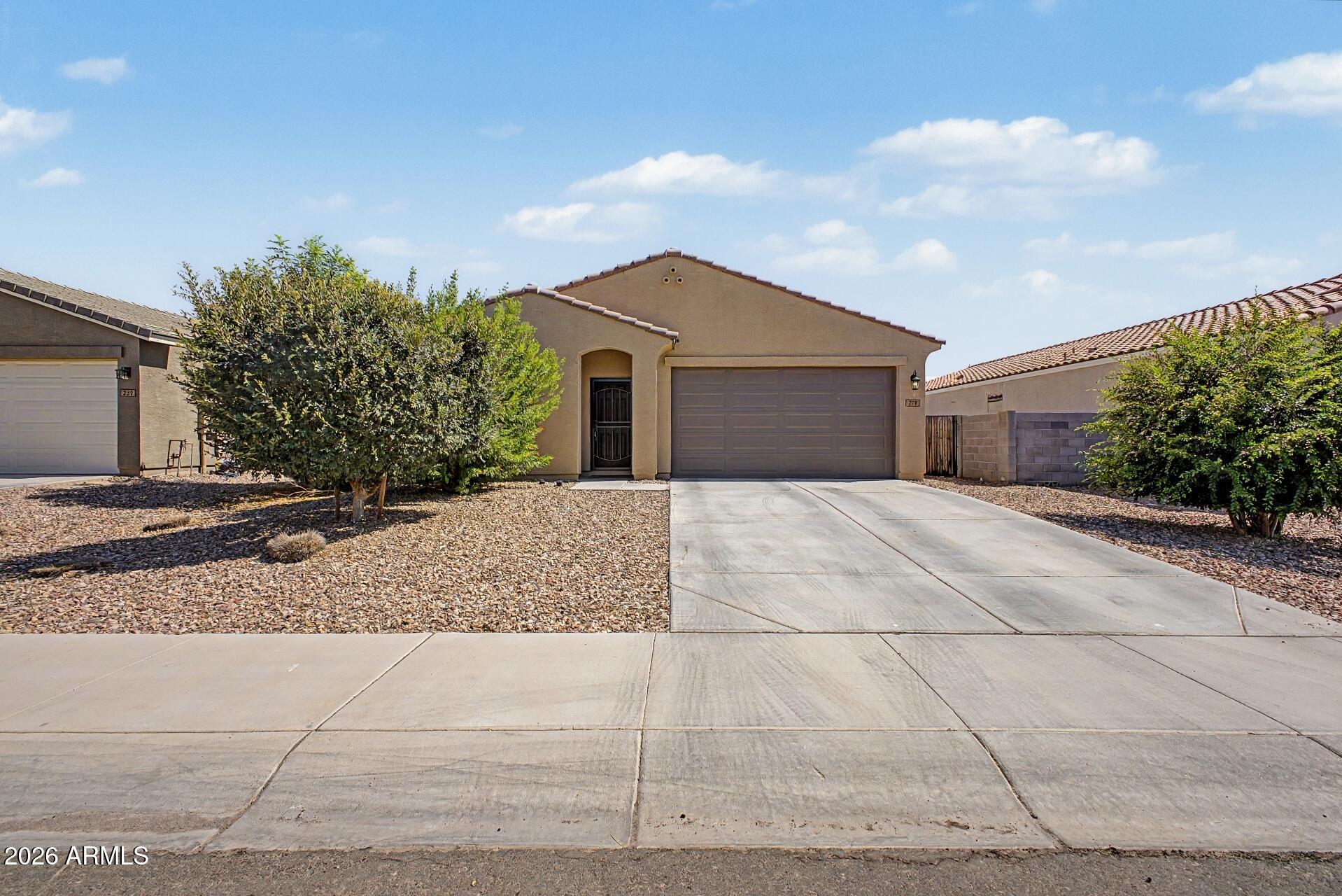 Beautifully upgraded 3-bedroom, 2-bath home with a versatile den, offering the perfect blend of comfort, style, and functionality! Thoughtful updates throughout include upgraded flooring and a beautifully remodeled primary bathroom featuring an enlarged walk-in shower and an improved walk-in closet designed for better organization and everyday luxury.

The home also includes valuable extras such as a water filtration system for enhanced water quality and convenience. Step outside to your own private backyard retreat complete with a built-in BBQ and sink, lush grass area, and mature lemon & lime tree -- perfect for entertaining, relaxing, or enjoying Arizona evenings outdoors. This well-maintained home offers inviting indoor and outdoor living spaces with upgrades you'll truly appreciate!