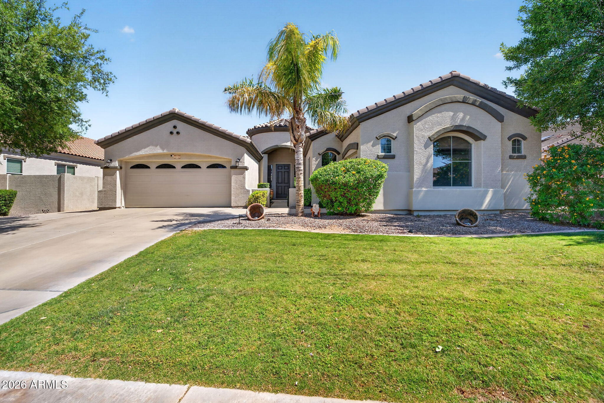Welcome to resort style living in the highly sought after Whispering Heights community. Beautiful recently upgraded single level home with a functional split floor plan.  Entertain with this open concept where living room, formal dining room and a gourmet kitchen complete with an expansive island all come together to look out into the backyard. Outside is your very own oasis with a salt water pebble tec pool, that's both heated and chilled, waterfall, and grotto. Surrounding the pool you have travertine, beautiful landscaping with grass area for the kids and pets. This home has been used by the family as well as a short and long term rental so you definitely have exit strategies to keep as an investment.