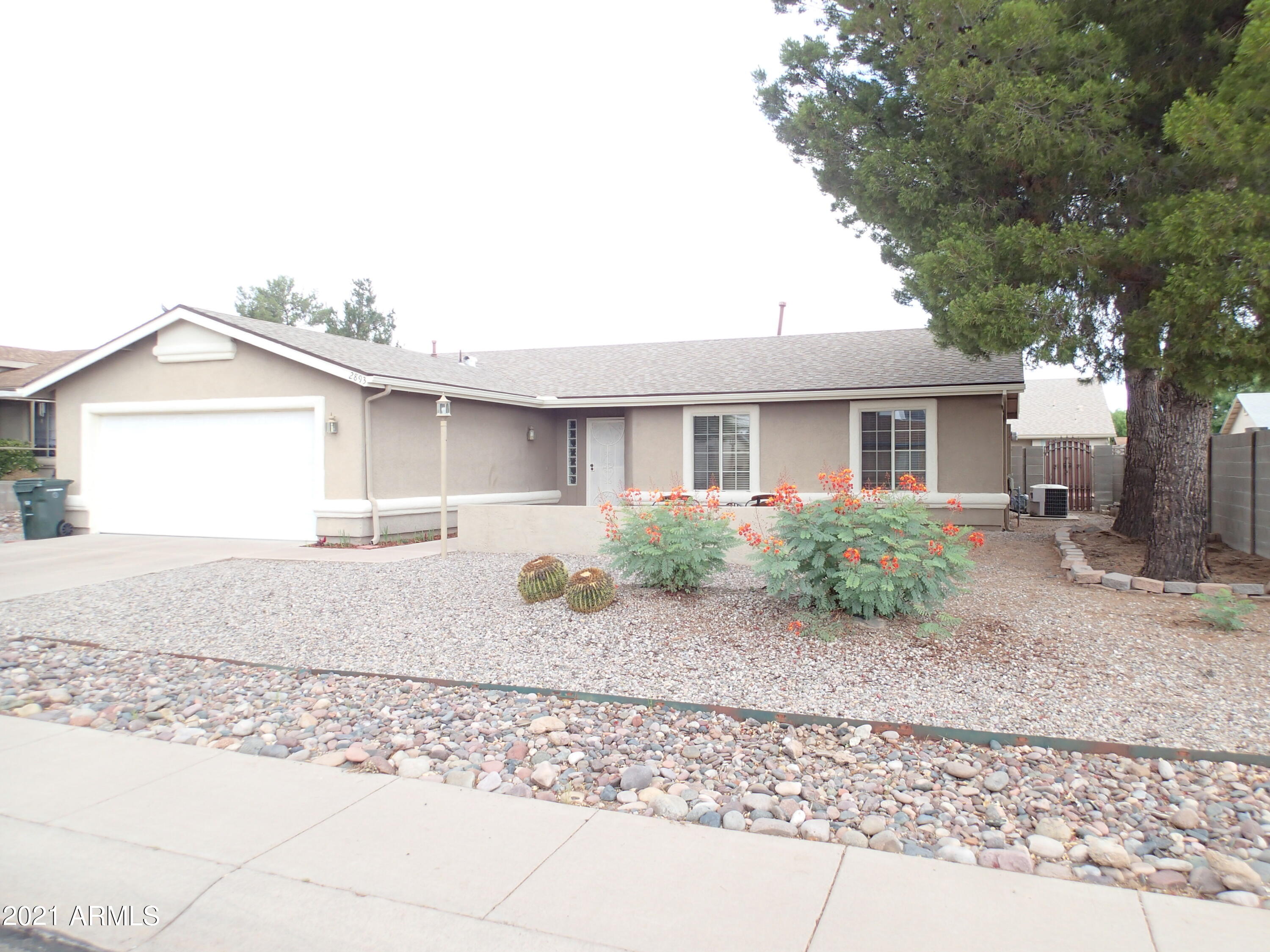 What a Find!! This 3br/2ba/2 car garage has a very open concept with Great room, Dining room and Breakfast area in Kitchen.  Huge Kitchen with Island, lots of cabinet space and Pantry closet. NO CARPET. All Wood Laminate flooring and Tile in wet areas. Master Bedroom and Bathroom  have 36'' doors and step in shower. Walk-In closet, plus bump out giving that extra space.  Back Yard is freshened up with new planting areas, grass, plus Fruit Trees!! Full Block wall and double gate  with parking area for your toys on the side. New roof Jan '20.  Won't Last Long!!! Call for private Showing.
