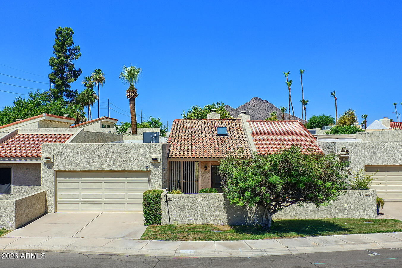 Charming Patio home located in the heart of Scottsdale.  Close to historic Old Town and icionic Fashion Square Mall complete with movie theater and all major brand store fronts.  This patio home features 2 large bedrooms, wooden floors, great room, kitchen nook, 2 car garage, and wonderful back patio.  Enjoy the hot tub to relax after a full day of shopping, golf, sports etc. Other amenities, Roll Screen secutity, sky lights, fans, vaulted ceilings, cul de sac location and newer water heater.  Walking distance to Chapparal park lake, Safeway Grocery, dog park, and heated community pool. Easy freeway acess to Loop 101 to visit any Phoenix locations.