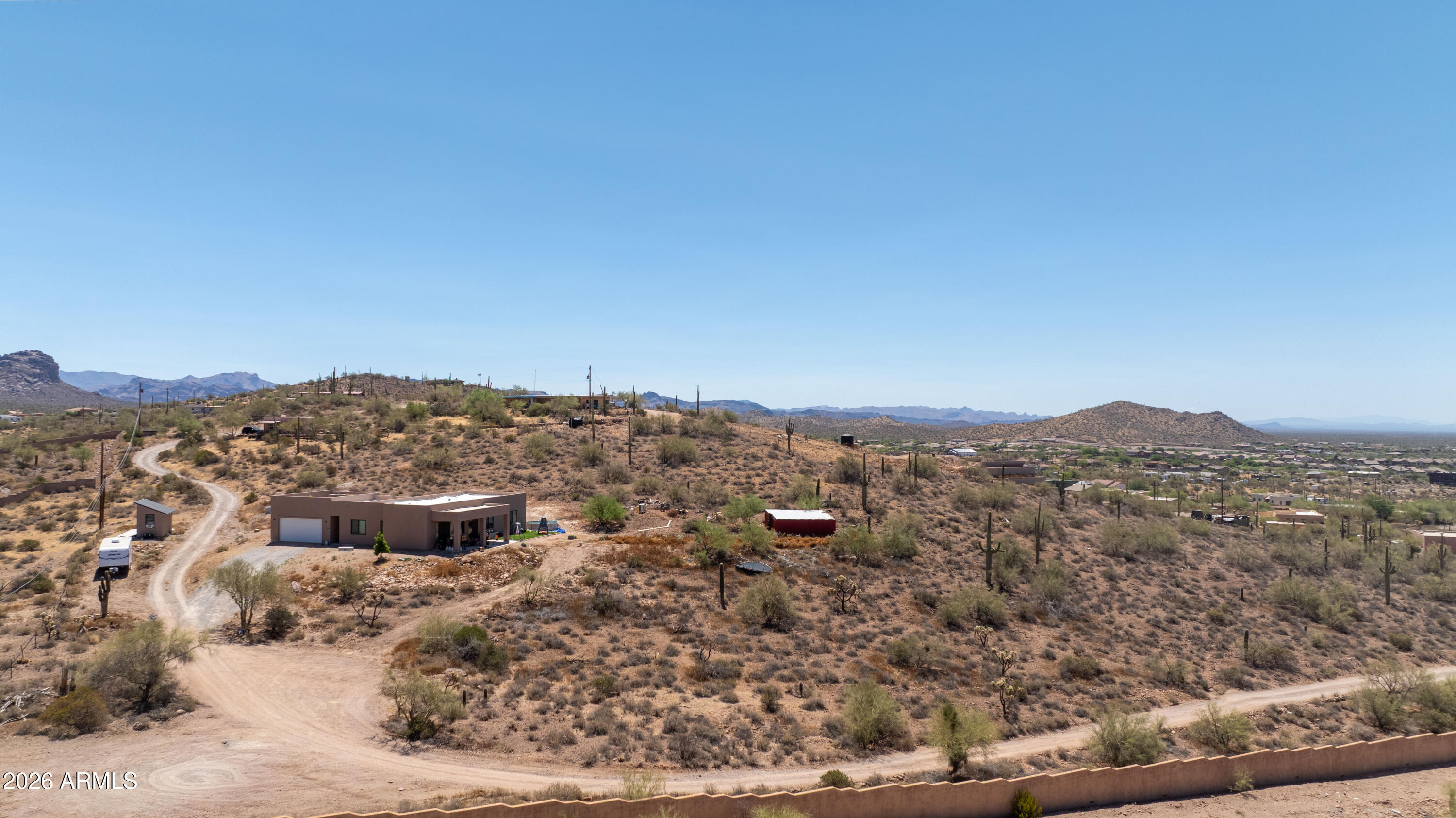 NO HOA! Vacant desert lot in the heart of Gold Canyon, tucked at the base of the Superstition Mountains. This 1.25 acre parcel offers sweeping mountain views and quick access to US-60. Build your dream home surrounded by saguaros and open desert, minutes from Gold Canyon golf courses, shopping, and dining. Power nearby, located on E Obsidian Ct. APN 104-04-008E. Don't miss this rare opportunity to own land in one of the fastest growing corners of the East Valley.