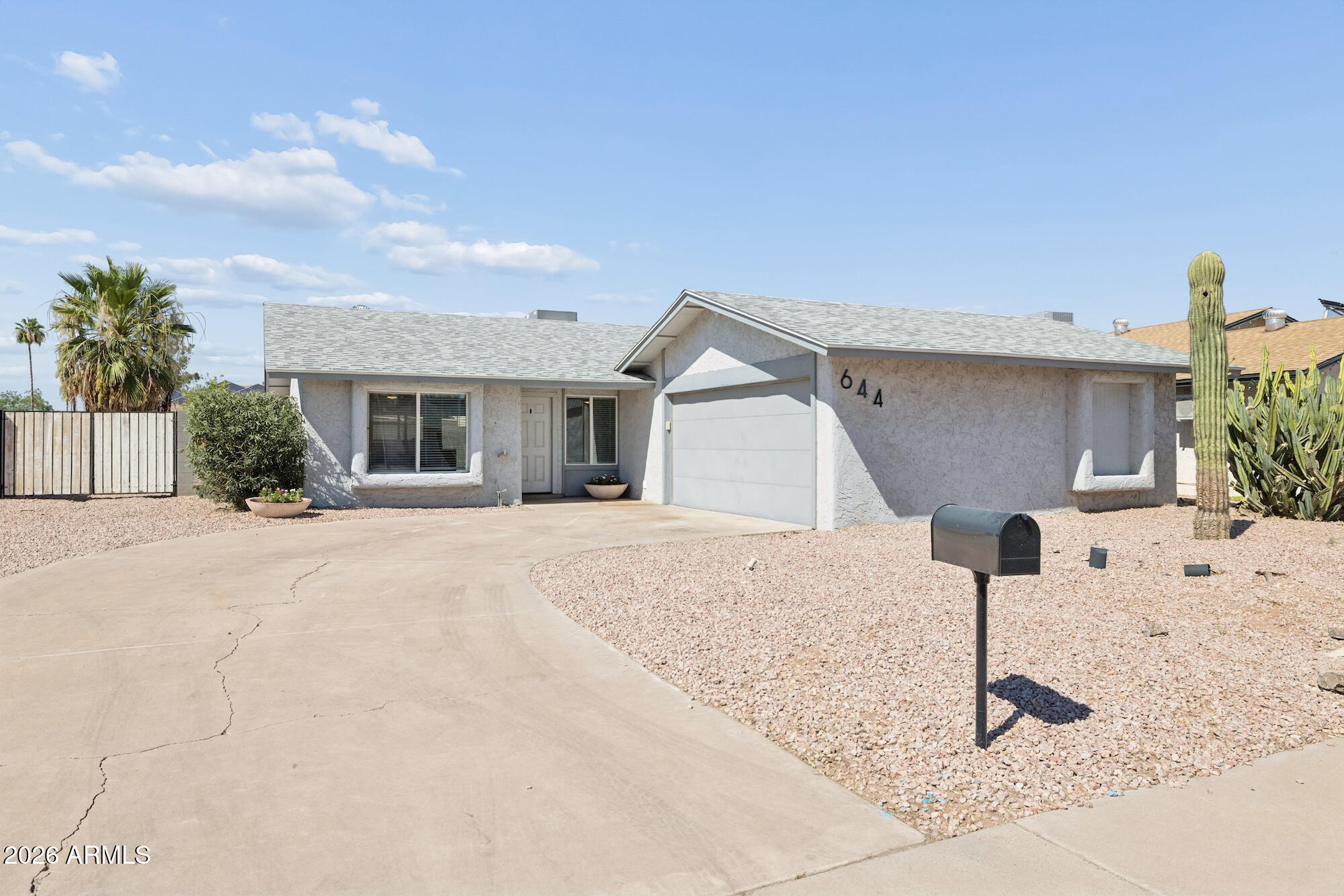 Tucked into a quiet neighborhood just minutes from major highways, restaurants, and shopping, this beautifully updated home offers the perfect blend of comfort, style, and convenience. Remodeled in 2020, it features a newer roof and AC (2020), newer lighting, newer ceiling fans for a move-in-ready feel. The inviting chef's kitchen includes a spacious island with seating for four, beautiful quartz countertops, all-new appliances, and a Thermador microwave. A dining room provides additional space for meals and gatherings. Both bathrooms feature beautiful tile work and glass doors. The stylish primary bath includes double sinks, while the second bath offers a tub. A well-cared-for home in a peaceful, convenient setting.
