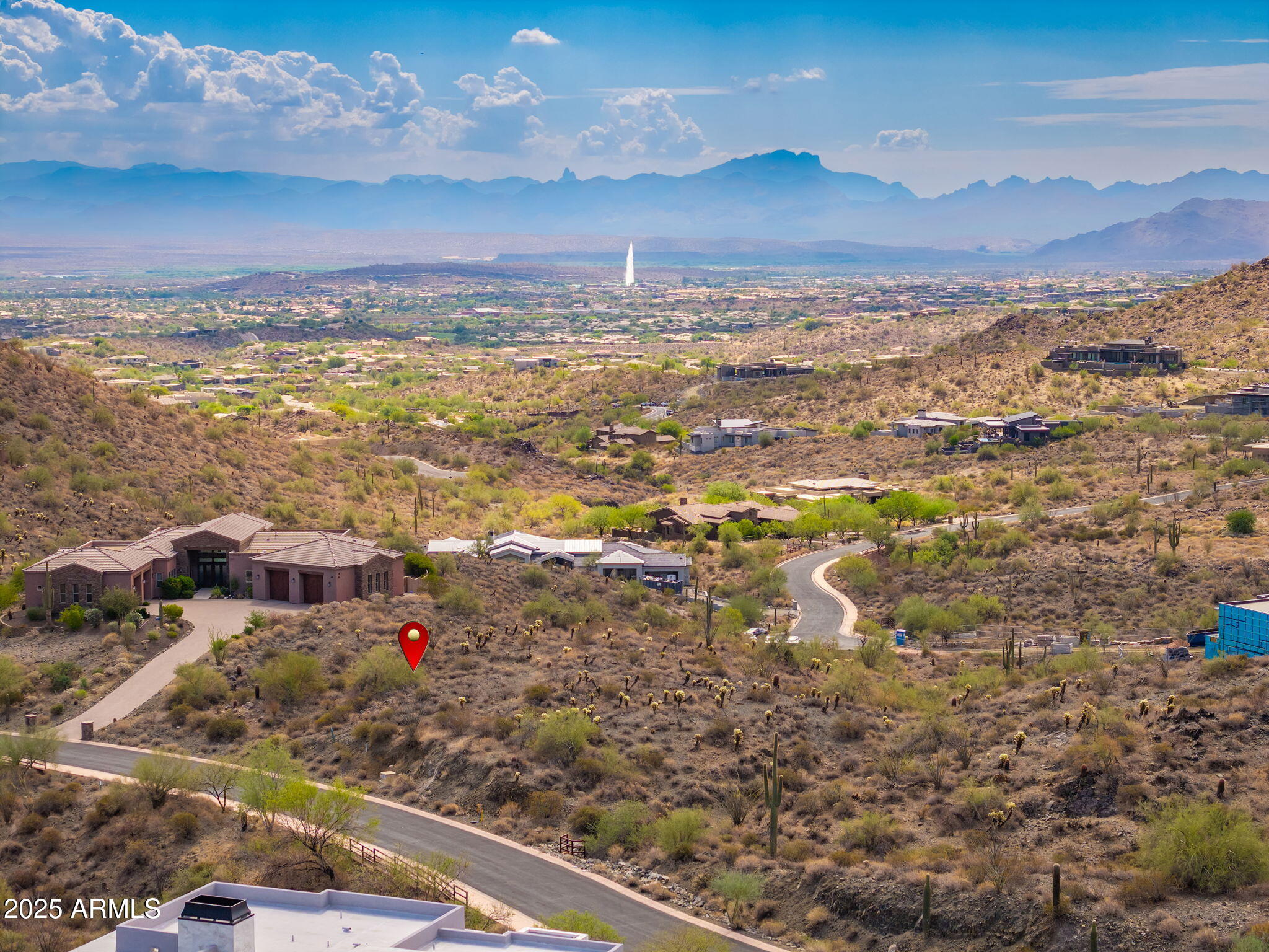 Eagles Nest • Gated luxury community • Elevated 1.1-acre homesite • Four Peaks, Superstitions & Goldfields views • Underground utilities • Easy-build lot - Perched within the exclusive gates of Eagles Nest, this elevated 1.1-acre homesite captures awe-inspiring views of Four Peaks, the Superstitions, the Goldfields, and the world-famous Fountain. Designed for effortless construction, the lot offers a generous building envelope, gentle topography, underground utilities, public sewer, and private water—rare conveniences in a desert-view setting. The surrounding landscape is a striking mix of luxury custom estates, pristine Sonoran vegetation, and signature saguaros, creating a setting worthy of architectural distinction. Ideal for a new luxury build that celebrates panoramic vistas and seamless indoor-outdoor living, this property combines privacy, beauty, and build efficiency in one of Fountain Hills' most prestigious communities. A premier opportunity to craft a signature residence with commanding views and timeless appeal.

Nearby Amenities List
- Eagles Nest Community Entrance: on-site
- Fountain Park: 2.9 mi
- Safeway (Fountain Hills Blvd): 2.1 mi
- Starbucks (Fountain Hills Blvd): 2.2 mi
- McDowell Mountain Regional Park: 6.4 mi
- Mayo Clinic Scottsdale: 10.1 mi
- Scottsdale Airport: 17.5 mi