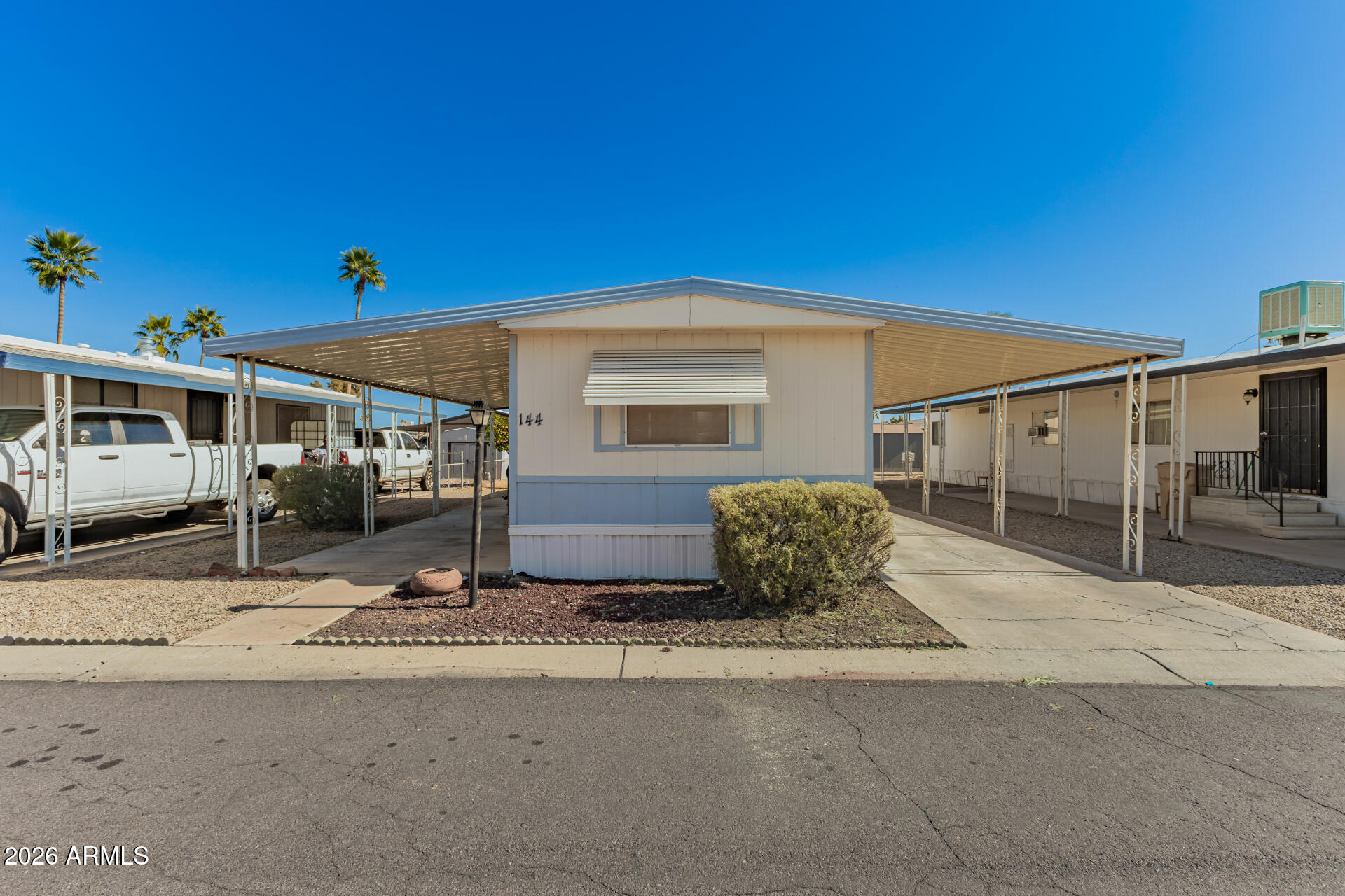 ALL-AGE COMMUNITY.  2 FREE MONTHS IF CLOSED BY END OF JUNE! This charming 2-bedroom mobile home in Suncrest is waiting for its new owners! New Carpet, New Vinyl flooring, 2024 water heater. Includes washer/dryer and refrigerator. You're greeted by a practical carport and a front patio that sets an inviting tone. Inside, the appealing open layout features wood panel walls and soft carpeting for added comfort. The eat-in kitchen comes with ample wood cabinets, wallpaper, built-in appliances, and a peninsula with a breakfast bar for quick meals. The cozy main bedroom includes a private bathroom for convenience. Outside, you'll find a shed for additional storage. Don't miss out on this fantastic opportunity! You won't offend us.  Make us an offer.