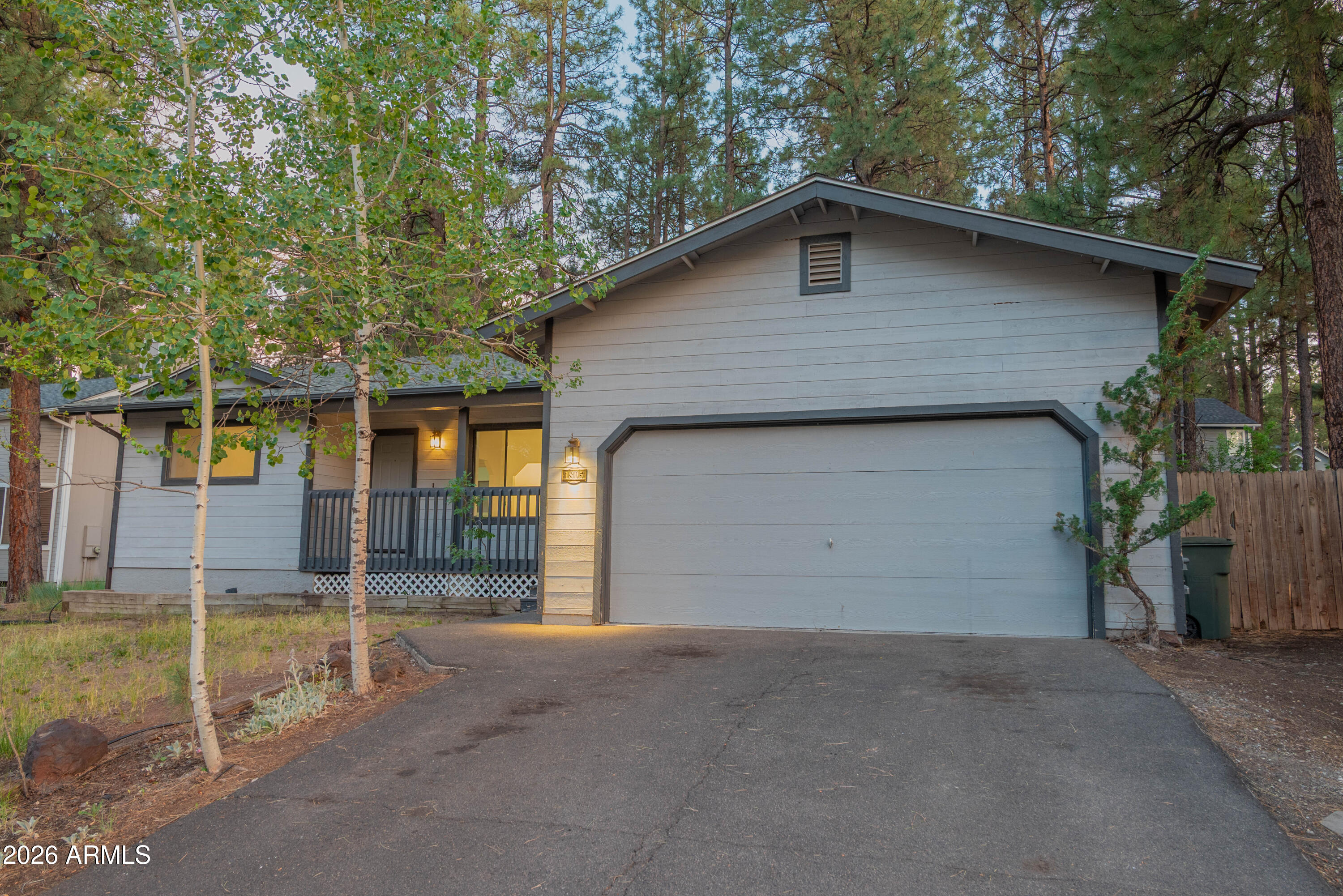 Priced to make Flagstaff homeownership a real possibility, this single-level home offers a nice backyard, a convenient location, and a price point that works in today's market. Clean, functional, and ready for its next family, the home offers casual, easy everyday living with the opportunity to create something special over time. The heavily pine-treed backyard brings a true Flagstaff mountain vibe and welcomes weekend barbecues, family fun, outdoor gatherings, or quiet mornings in the fresh mountain air. Close to NAU, trails, shopping, dining, schools, and easy access around town, this home sits in a highly desirable area buyers continue to love. A smart opportunity to enjoy Flagstaff now, make this home your own, and become part of an established neighborhood.