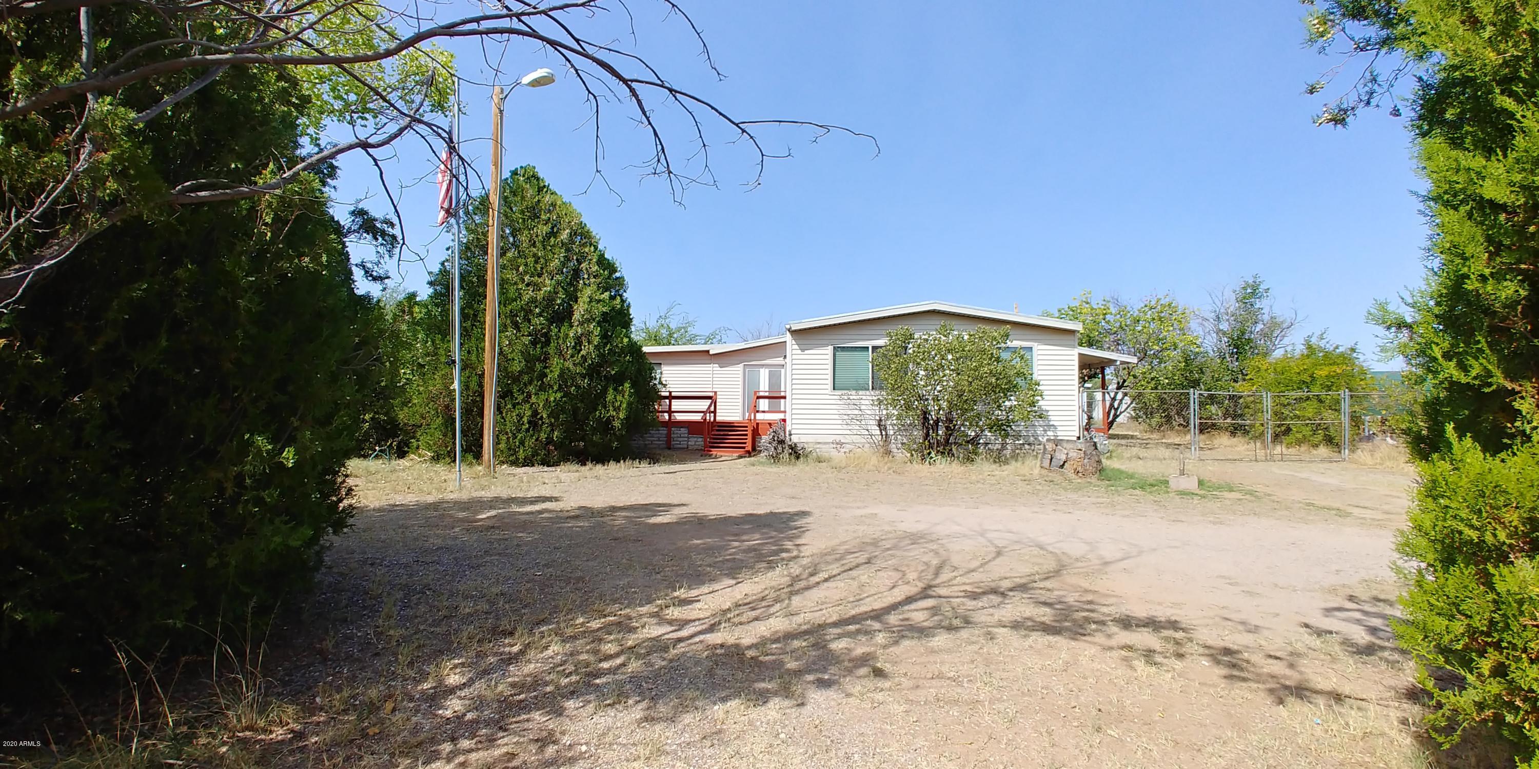 This is a great opportunity to puchase with wonderful home at a great price. This home has been very well cared for and has been in the same family since it was placed on the property. There is a formal living and dining room with built ins and a family room too. You will love the large bonus room with lots of skylights making it a very happy room. There is a great kitchen with plenty of counter spance and cabinetry. There is a 2+ car garage and 2 sheds too. Chain link fencing arund the entire property makes this property very secure. Best of all there is Private Well too! Mature landscaping and many peach trees and landscaping make this a great property for you. Call to see this one before it is gone! Conventional financing only.