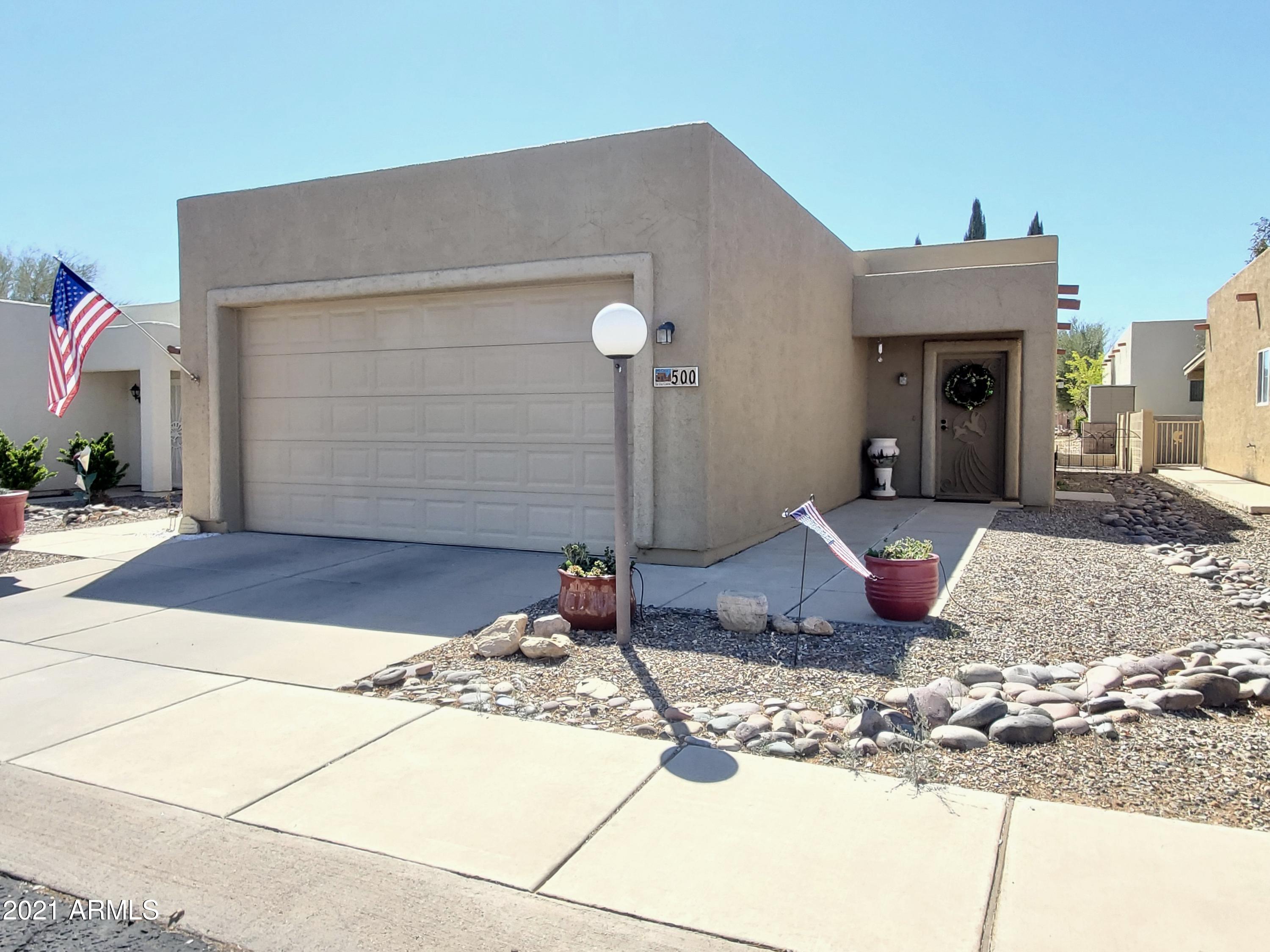 Back On The Market at no fault of the seller or home!  This ready to go home has 2 beds/2 baths and a 2 car garage on a great lot in Vista View.  The home is centrally located within the community, across the street from the Community Center: community pool, hot tub, and many indoor activities.  Get that exercise & socialization without worrying about the weather! There is a covered patio to enjoy the views and hummingbirds.  The home was originally built with many upgrades and has pride of ownership.  This gated, 55+ community has much to offer!  Resort fees cover property taxes, land lease and all of the many amenities.