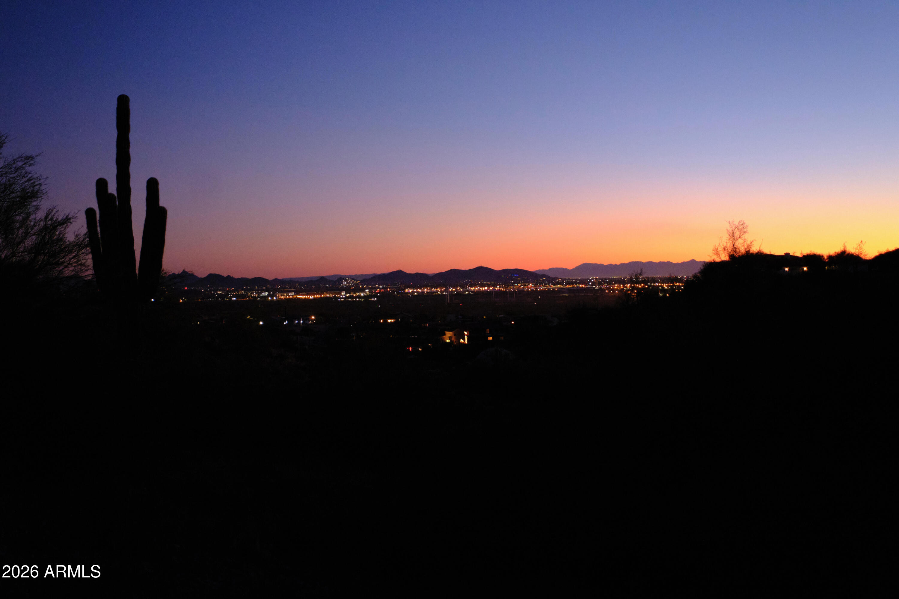 Private well! Ready-to-build with architectural plans available, hillside lot with both city and mountain unobstructed views!  Located near shopping, restaurants, freeways, and all the conveniences while still offering the quiet peacefulness of the Sonoran Desert! Set on over an acre of prime Phoenix real estate, the lot provides ample space to build the custom home you've always dreamed of with much of the prelim work already complete! access to modern conveniences. Enjoy the best of both worlds with close proximity to shopping, dining, and major freeways, while also being surrounded by endless outdoor recreation including hiking, biking, and horseback riding right outside your door. This is a rare chance to secure a premium homesite in one of North Phoenix's most desirable locationsperfectly positioned for a custom dream home with views that truly impress.