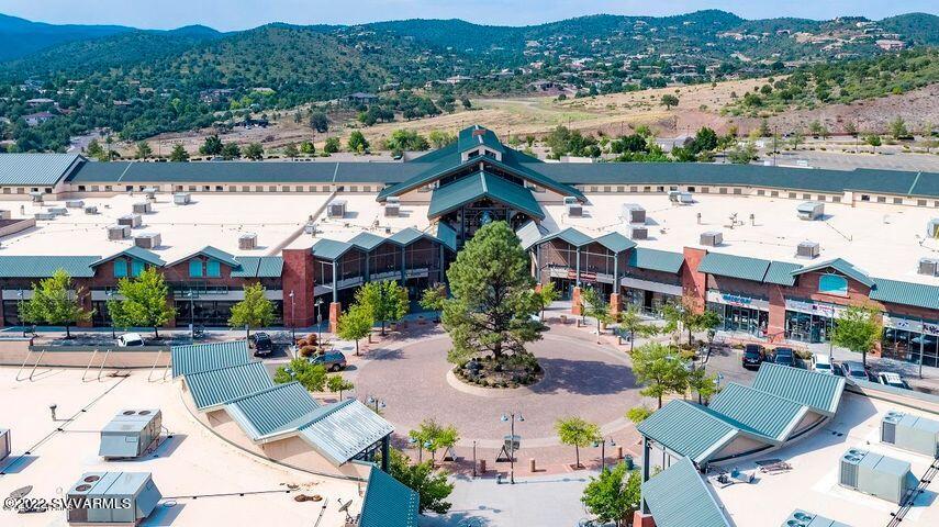 Prescott Gateway Mall is a modern, multifaceted regional shopping mall built in 2002, comprised of both an indoor traditional mall and an open-air outdoor lifestyle center. Indoors, under a magnificent exposed beam ceiling, are approximately 133,000 square feet and 67 suites, six of which serve an open and inviting food court. Outside, in the nicely landscaped open-air lifestyle center, 29 more suites occupy approximately 192,000 square feet. The property hosts national, regional and independent tenants including Bed Bath & Beyond, Michaels, Mattress Firm, Famous Footwear, Chico's, Bath & Body Works and Spencer's. Prescott Gateway Mall is an exciting value-addable opportunity for an investor looking to reposition the project. Some of the upsides include the potential of developing outparcels and/or selling the pads, building out the 21,000 square feet of gray shell space, increasing under market rents, rebranding the property and drawing alternative uses to the property. The possibilities are endless.
This is the only shopping mall for nearly 100 miles offering both an enclosed traditional mall shopping experience as well as an outdoor lifestyle and Town Center component. Flush with variety and centrally located, the mall functions as a community hub for the Quad City Area Prescott, Prescott Valley, Chino Valley, Dewey-Humboldt - and beyond.
Demographically, the area continues to grow at a remarkable rate, fueled by a steady stream of new arrivals seeking refuge from the tax and regulation burdens of bigger cities and states.
Prescott Gateway Mall is located in the area's prime retail hub at the intersection of State Route 69 and Prescott Lakes Parkway. It is surrounded by Class A retail, restaurant and service tenants including Costco, Walmart, Lowe's, Trader Joe's, Best Buy, Red Robin, Olive Garden, In-N-Out, and US Bank, as well as some of Prescott's most prestigious and established residential communities and a flourishing retirement community.