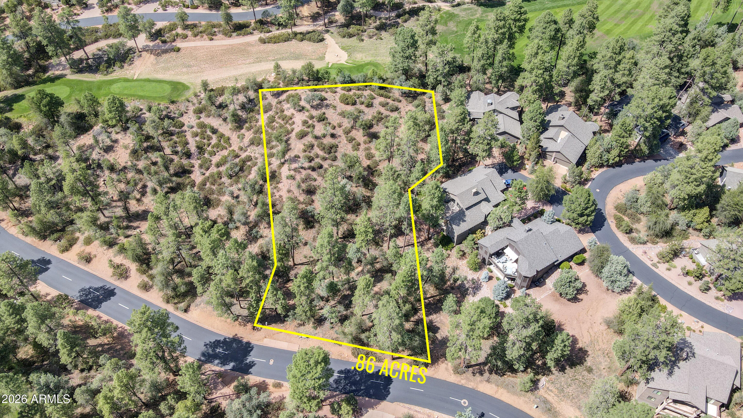 Experience all four seasons in this stunning mountain town with this spacious hilltop building site. Nearly an acre of prime land offers sweeping views of the 18th hole and the picturesque Mogollon Rim. Nestled within a prestigious country club community, this property provides access to exclusive amenities, including fine dining, a luxurious clubhouse, and more. Perfect for crafting your dream home, this lot combines natural beauty with. Don't miss the opportunity to build your ideal retreat in this exceptional neighborhood. Don't miss your chance to see this spectacular, One-of-a-kind lot.