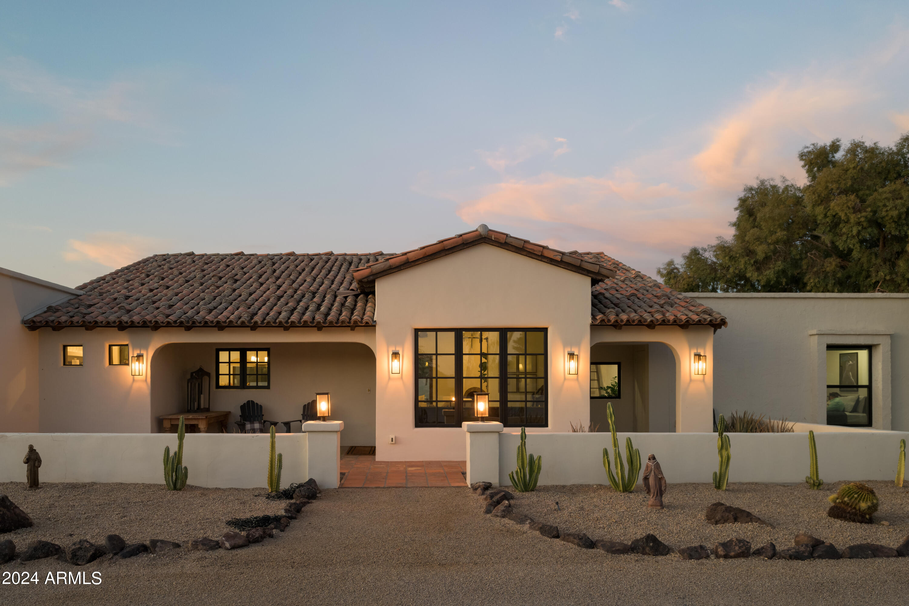 Don't miss the chance to make this spacious, North Scottsdale estate yours. The owners of this ranch-style residence spared nothing when transforming the property into a welcoming, tranquil home.

The fully renovated main house offers 3000 SF, 4 bedrooms and 3 baths, while the private casitas afford buyers an additional 3 bedrooms, 2 baths, kitchen and living space. 

There's plenty of space for indoor relaxing, outdoor fun, fitness, guests and more. The 2.2 acre lot includes, detached 4 car garage, two casitas, a pool, an organic garden and basketball court, still with room for more. Privacy gates provide peace of mind for residents, while still enabling the retreat feel. 

This property offers so much and has an incredibly special feel you won't want to pass up.
