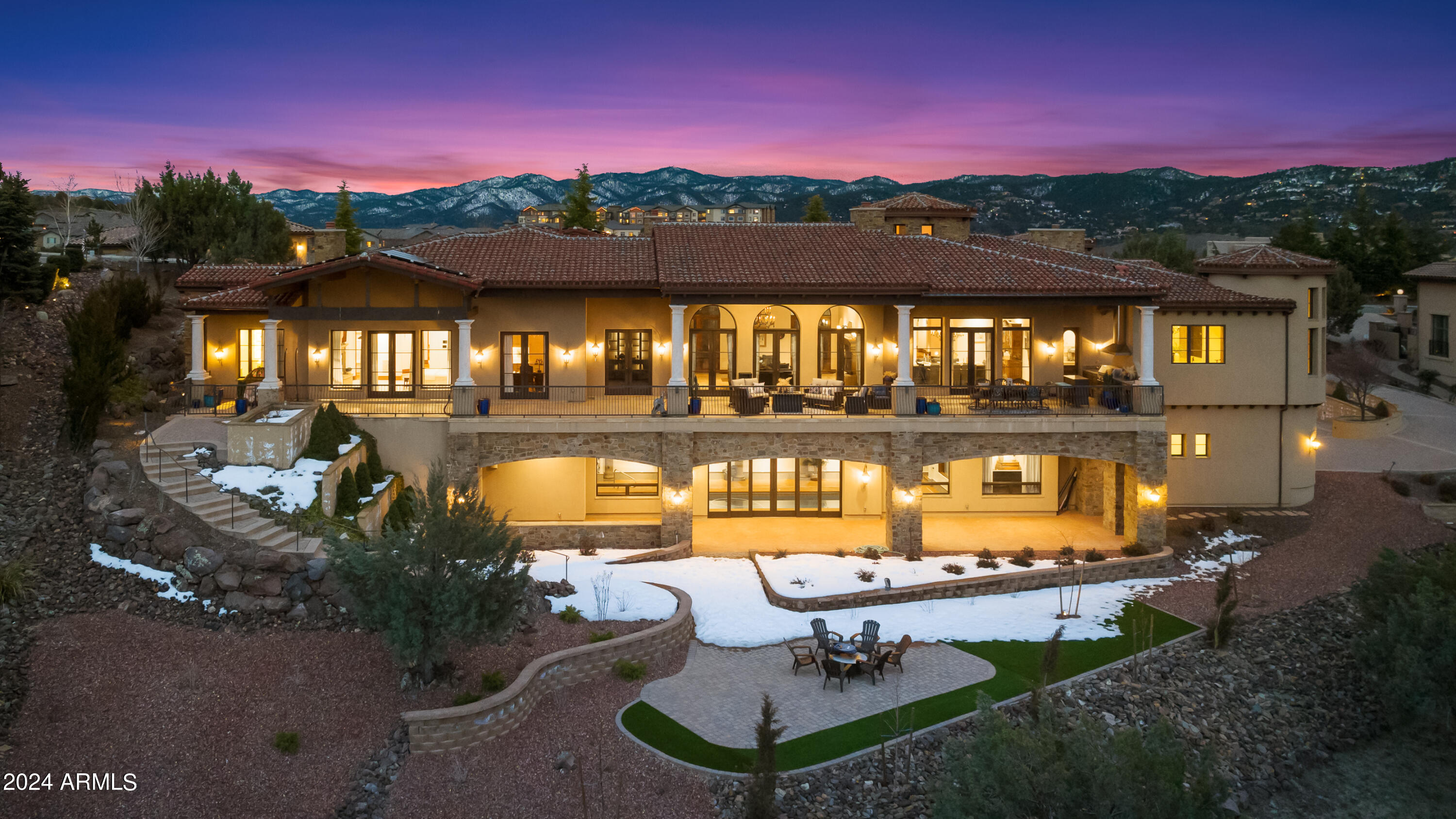 *Motivated Seller - Seller Financing Avail, $10.4MM Build Cost* Benvenuto a 'Casa di Buona Fortuna'-  This Tuscan inspired masterpiece perched in the The Ranch provides breathtaking views, opulent luxury, and convenience unmatched in Prescott. 
The primary level is centered around an open-air central courtyard and features a sprawling master wing including 1 of 2 private elevators to the lower level, his and hers offices, a sitting area complete with wet bar, and dual walk-in closets large enough for the most extensive wardrobes. Starry-night home theater furnished with plush seating for eight. The opposite wing of suites includes a wet bar, formal dining area, family room, fireplaces and formal living room, spacious kitchen with tastefully appointed with Miele appliance