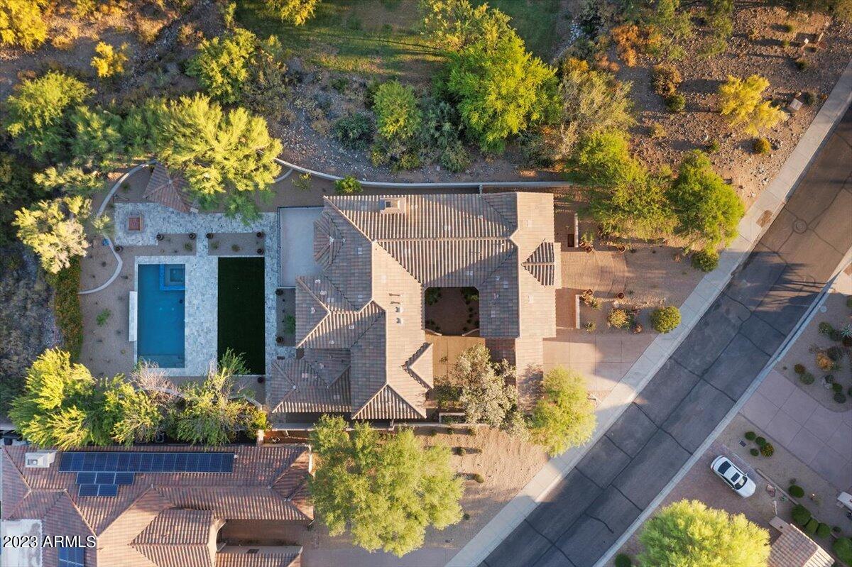 4,955 SQ.FT. / 4 BEDROOM WITH DEN OPTION CONVERSION TO 5 BEDROOMS / 3.5 BATHS CUSTOM HEATED POOL / SPA WITH ELONGATED WATER FEATURE / STONE FINISHES & COPING PROFESSIONAL FRONT AND REAR NEW LANDSCAPING W/BBQ AND EXT FIREPLACE 
- COMMERCIAL GRADE HOME APPLIANCE PACKAGE (FRIDGE/OVEN/COOKTOP/COFFEE/HOOD/DISHWASHER/MICROWAVE) 
16' EXPANSIVE AND 10' HIGH STACKABLE WESTERN DOOR SYSTEM. AT FAMILY RM NEW EXT DOORS AND WINDOWS / NEW EXOTIC WOOD ENTRY DOOR W OVERSIZED PULL HARDWOOD WHITE OAK FLOORS W/HERRINGBONE INLAY AT FOYER / CUSTOM STAIR TREADS 
- PORCELAIN TILE LARGE FORMAT FLOORS / STONE FLOORS - PORCELAIN TILE LARGE FORMAT WAINSCOTING / STONE WAINSCOTING 
CALCUTTA MARBLE & QUARTZ COUNTERTOPS / WATERFALL EDGE COUNTERTOP - EUROPEAN STYLE CABINETRY ''PRETTY MUCH A NEW - LINEAR LOW PROFILE LINEAR FIREPLACE AT FAMILY ROOM(CUSTOM FURNITURE GRADE CLOSET AT MASTER WALK-IN W/AMBIENT LIGHTING / 
MIRRORS(OVERSIZED MASTER SHOWER WITH BODY SPRAYS/RAINHEAD/HANDHELD FIXTURES 
- CUSTOM OVERSIZED SOAKING TUB AT MASTER BATH COMMERCIAL GRADE LOW PROFILE CANNED LIGHTING SYSTEM THROUGHOUT 
- DESIGNER CHANDELIERS / LIGHT FIXTURES / CEILING FANS · DESIGNER PLUMBING FIXTURES AND FAUCETS T/O(- TOTO TOILETS AND CUSTOM BATH FIXTURES(- 97% SMOOTH DRYWALL COAT FINISH(- NEW INTERIOR / EXTERIOR PAINT 
CUSTOM GARAGE DOOR / MOTOR / ELECTRIC VEHICLE CHARGING STATION / EPOXY FLOORS 
- NEW A/C UNITS / WATER HEATERS(- NEW SYNTHETIC STUCCO FINISH(- NEW PLUMBING LINES / NEW ELECTRICAL WIRING / NEW INSULATION 
CUSTOM IRON HAND FORGED BALCONY RAILING AND STAIRWELL RAILING OVERSIZED TRIM MOLDINGS AND EXTENSIVE MILLWORK AT STUDY / MASTER / FAMILY ROOM - see motion video