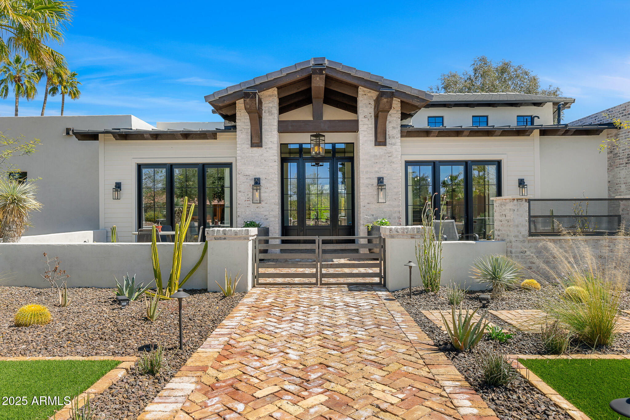 Look no further! In the prestigious neighborhood of Stoneridge Estates, this stunning 4,670sqft home is a testament to refined living and offers unparalleled privacy and tranquility. As you step through the grand entrance, you are greeted by an opulent interior featuring five generously issued bedrooms each with their own private bathrooms. The formal dining room is a masterpiece, perfect for hosting sophisticated dinner parties and intimate gatherings. Open concept living space with beautiful wood flooring and soaring beams. The gourmet kitchen outfitted with top-of-the-line Energy Star appliances also features an oversized eat-in island, a butler's pantry, and gas range, ample storage and nearby wet bar. Primary suite is a breath of fresh air with a cozy fireplace, two walk-in closets, dual vanity, soaking tub and an impressive walk-in shower. Indulge in the ultimate outdoor experience with your own private pool, surrounded by lush landscaping that provides a serene backdrop for relaxation and entertainment. The interior's tile floors exude timeless elegance, while the wet bar elevates your hosting capabilities. This residence is more than a home; it is a lifestyle. Scottsdale Luxury living at its finest.