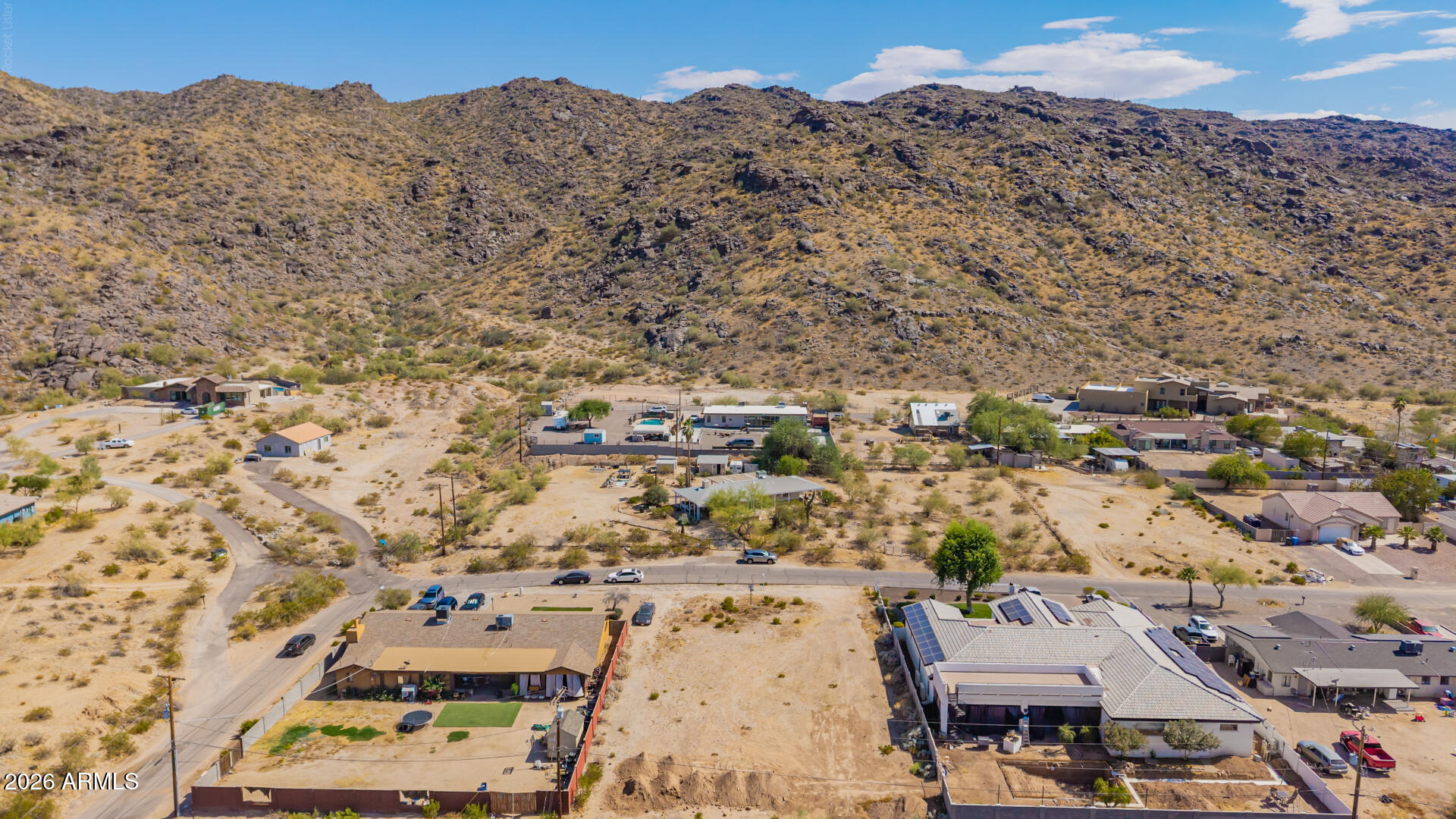 Located at the prestigious base of South Mountain, this exceptional 100' x 150' homesite offers a rare opportunity to own 15,000 square feet in one of the Valley's most desirable and rapidly appreciating areas. Opportunities like this are becoming increasingly difficult to find, especially in a neighborhood defined by luxury custom homes, breathtaking mountain scenery, and strong long-term value.
From the moment you step onto the property, the views are simply stunning. South Mountain provides a dramatic natural backdrop, creating a setting that feels both private and inspiring. Imagine waking up to panoramic mountain vistas, enjoying colorful Arizona sunsets from your backyard, and experiencing the beauty of the desert landscape every day.