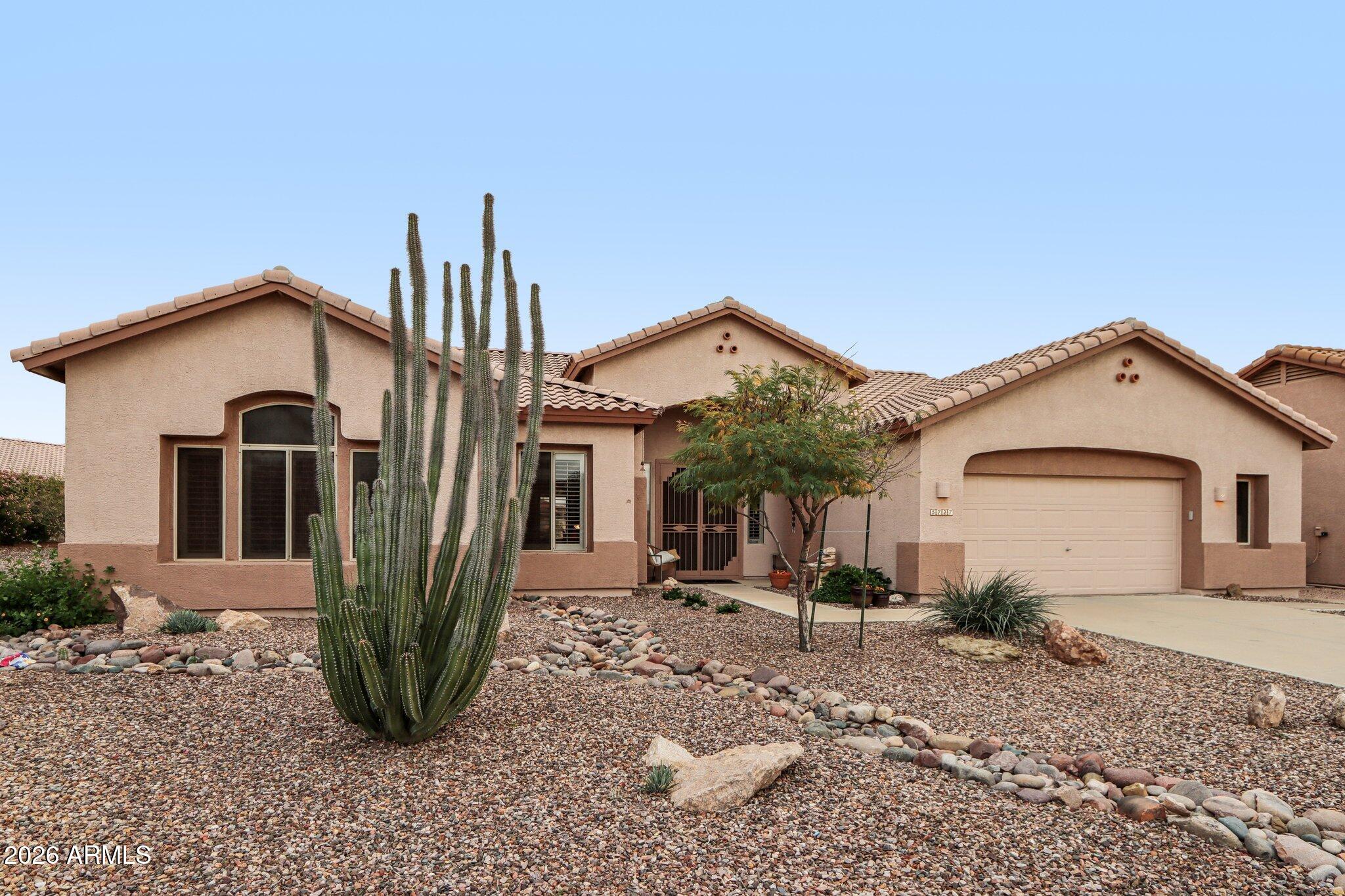 Tucked into a quiet cul-de-sac in Gold Canyon's coveted Mountainbrook Village, this 2-bedroom, 2-bath with a den, single-level home delivers the Arizona lifestyle you've been picturing -- open desert light, championship golf moments from your door & uninterrupted views of the Superstition Mountains. Inside, 2,294 square feet of thoughtfully designed living space flows easily from room to room, ideal for everyday ease, weekend guests, or hosting friends after a round. The split floor plan offers a private primary retreat, a spacious great room, and a kitchen built for both quiet mornings & lively gatherings. Step outside to your patio & the desert opens up -- sunrise over the Superstitions, sunset over the saguaros & a sky that reminds you exactly why you came. Situated on a spacious, low-maintenance lot, this property delivers privacy & ease of care, for an easy maintenance lifestyle ideal for full-time residents or lock-and-leave winter homeowners. 

Beyond your front door, residents enjoy a beautifully appointed clubhouse, heated pool / spa, fitness center, pickleball courts, tennis courts, walking paths & a full calendar of clubs and activities. Community offers convenient access to hiking, golf, dining & everyday amenities.
Gold Canyon is consistently ranked as one of the best places near Phoenix for retirees seeking quiet desert beauty without sacrificing convenience & just a short drive to Mesa, Gilbert, Chandler & Sky Harbor Airport. MountainBrook Village is one of Gold Canyon's premier active adult communities.