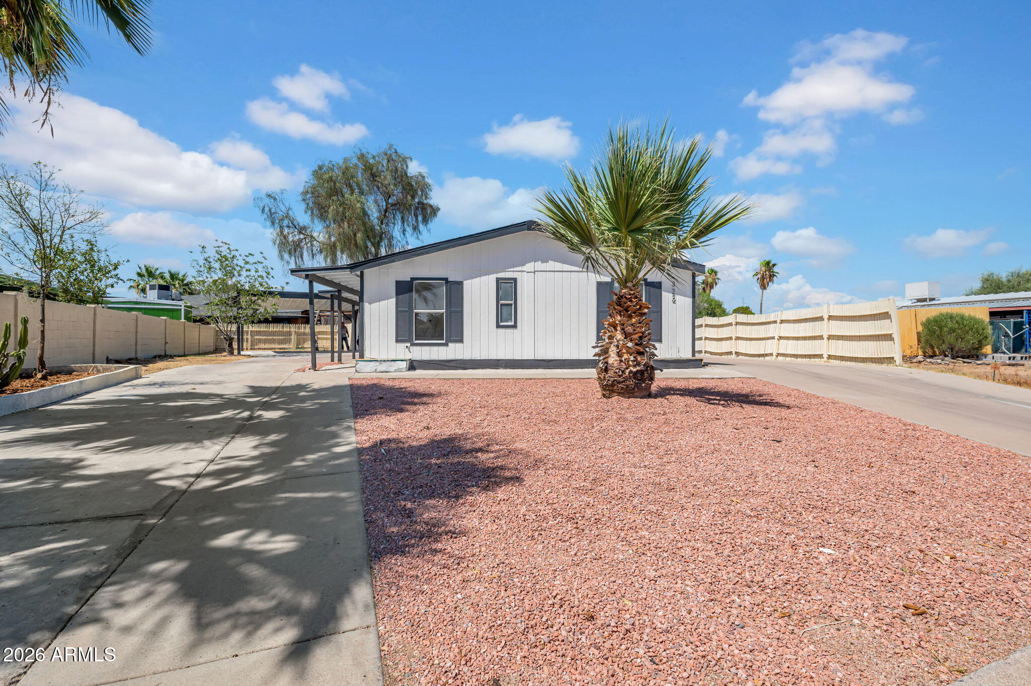OWNED LAND! NO HOA! BRING YOUR TOYS! Rare lot with DOUBLE driveway and massive 2 car extended carport! Huge storage room! This large 4 bed, 2 bath home has just went under a full remodel! Brand new HVAC unit! Enjoy all new flooring, trim, doors, appliances, lights, paint, landscaping, showers and much more! This is the home that you have been waiting for!
