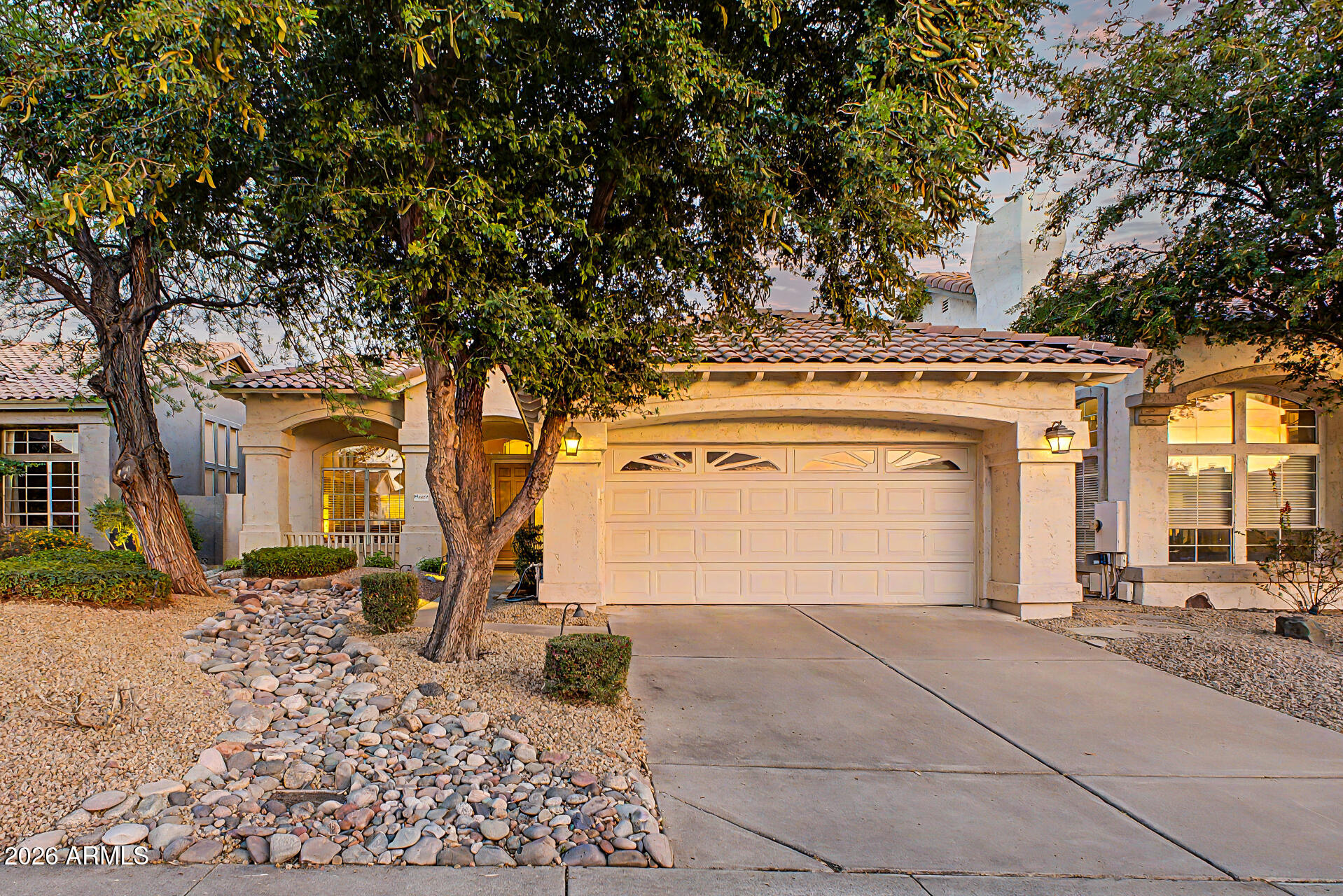 Welcome to a beautifully maintained, truly move-in ready home in the highly sought-after Tatum Ranch community. From the moment you arrive, it's clear this home has been exceptionally well cared for, offering a level of pride of ownership that's increasingly hard to find. Inside, soaring vaulted ceilings and an abundance of natural light create a bright, open feel that makes the home live larger than its square footage. The thoughtful layout provides a seamless flow between living spaces while still offering comfortable separation, creating a home that feels both open and inviting. Whether you're relaxing at home or hosting guests, the design and condition of this home make everyday living easy. This 3-bedroom home continues to impress with its clean, well-kept condition and thoughtful design throughout. Every space feels intentional, maximizing usability while maintaining a comfortable, inviting atmosphere. The primary suite serves as a private retreat, complete with direct access to the backyard, allowing for an easy connection to outdoor living and a quiet place to unwind.

The backyard is where this home truly separates itself. Positioned on a premium lot backing to a wash with mature desert landscape beyond, the setting offers a rare combination of openness and privacy. With a view fence, no neighbors behind, and surrounding single-story homes, you're able to enjoy unobstructed views, natural desert beauty, and a sense of space that's hard to replicate.

Designed for Arizona living, the backyard features a pool, spa, and covered patio, creating the perfect setup for relaxing evenings, weekend gatherings, or simply enjoying the outdoors year-round. Whether you're entertaining guests or enjoying a quiet sunset, this space delivers.

Homes that offer this level of care, combined with a premium lot and privacy like this within Tatum Ranch, are few and far between.