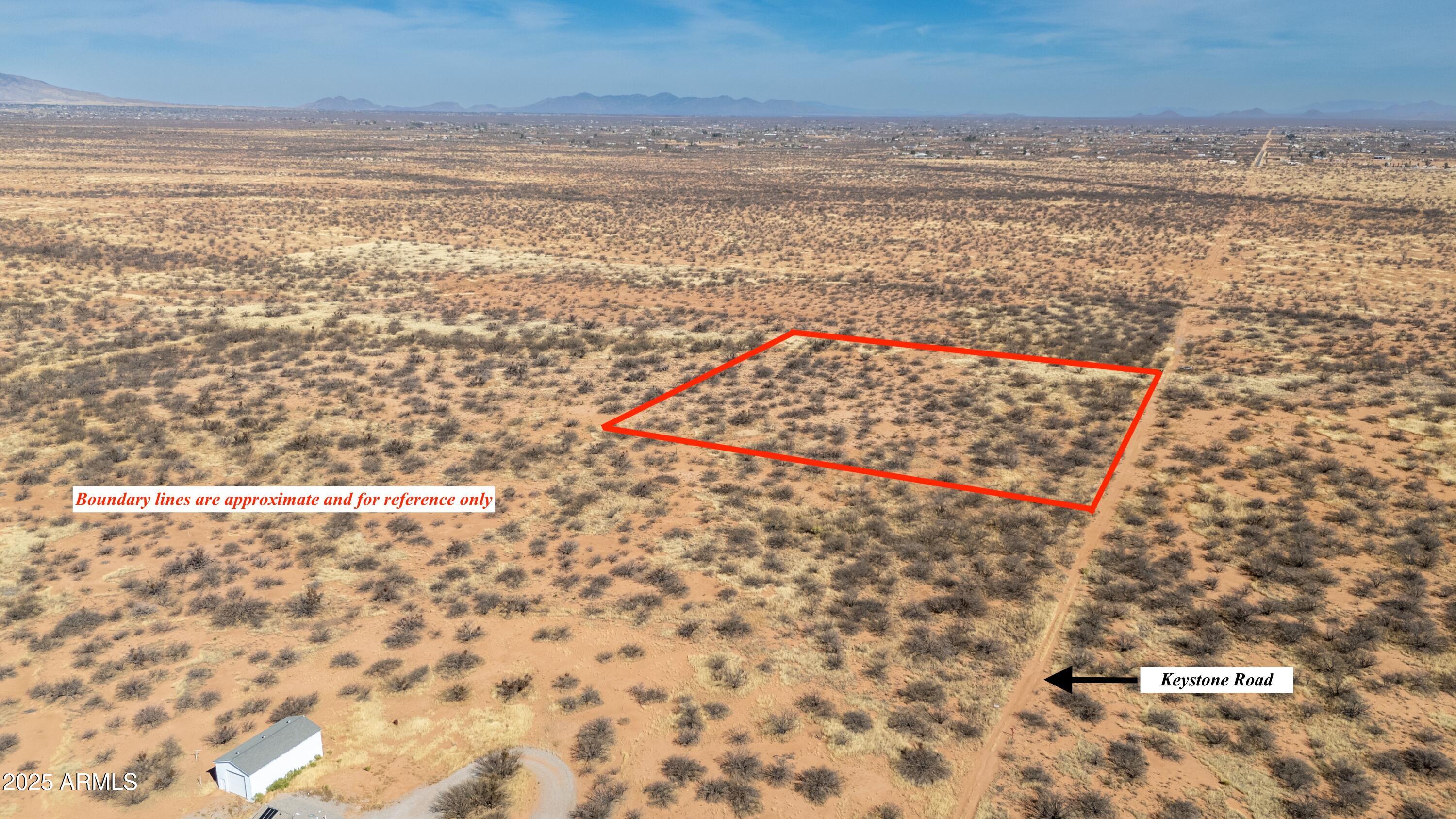 Quiet, Remote 8+ Acres of land in prestigious 3 Canyons. Spectacular mountain views of the Huachuca's, Mules & San Jose. Lots of trees! Bring your animals, build your dream home on this secluded parcel! An additional 8.145 Acre parcel available adjacent on the North Boundary.