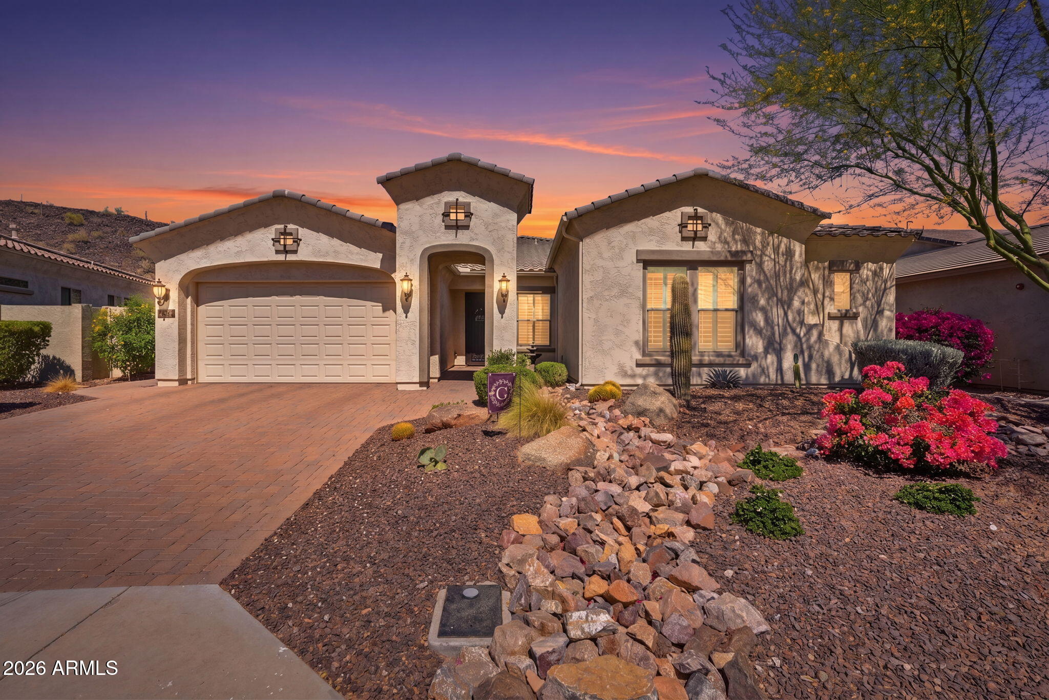 Welcome to this beautifully upgraded David Weekley Azalea model located in the highly sought-after Vistancia Village community. Built in 2019, this thoughtfully designed single-level home offers 3 bedrooms, 3.5 bathrooms, a dedicated den, and over 2,700 square feet of open living space.
The home features an inviting open-concept floor plan with abundant natural light and seamless flow throughout. The gourmet kitchen is perfect for entertaining with quartz countertops, a large center island, walk-in pantry, built-in appliances, and gas cooking. The spacious great room and dining area create an ideal setting for both everyday living and hosting guests. The split floor plan provides privacy, with a luxurious primary suite featuring a spa-like ensuite bathroom, dual vanities, separate tub and shower, and an oversized walk-in closet. Each additional bedroom offers its own private bathroom access, creating comfort and convenience for family or guests.
Additional highlights include a 4-car garage, smart home features, soft water loop, covered patio, and a backyard ready to enjoy. Located within the award-winning Vistancia master-planned community, residents enjoy access to parks, walking trails, community amenities, and top-rated schools.