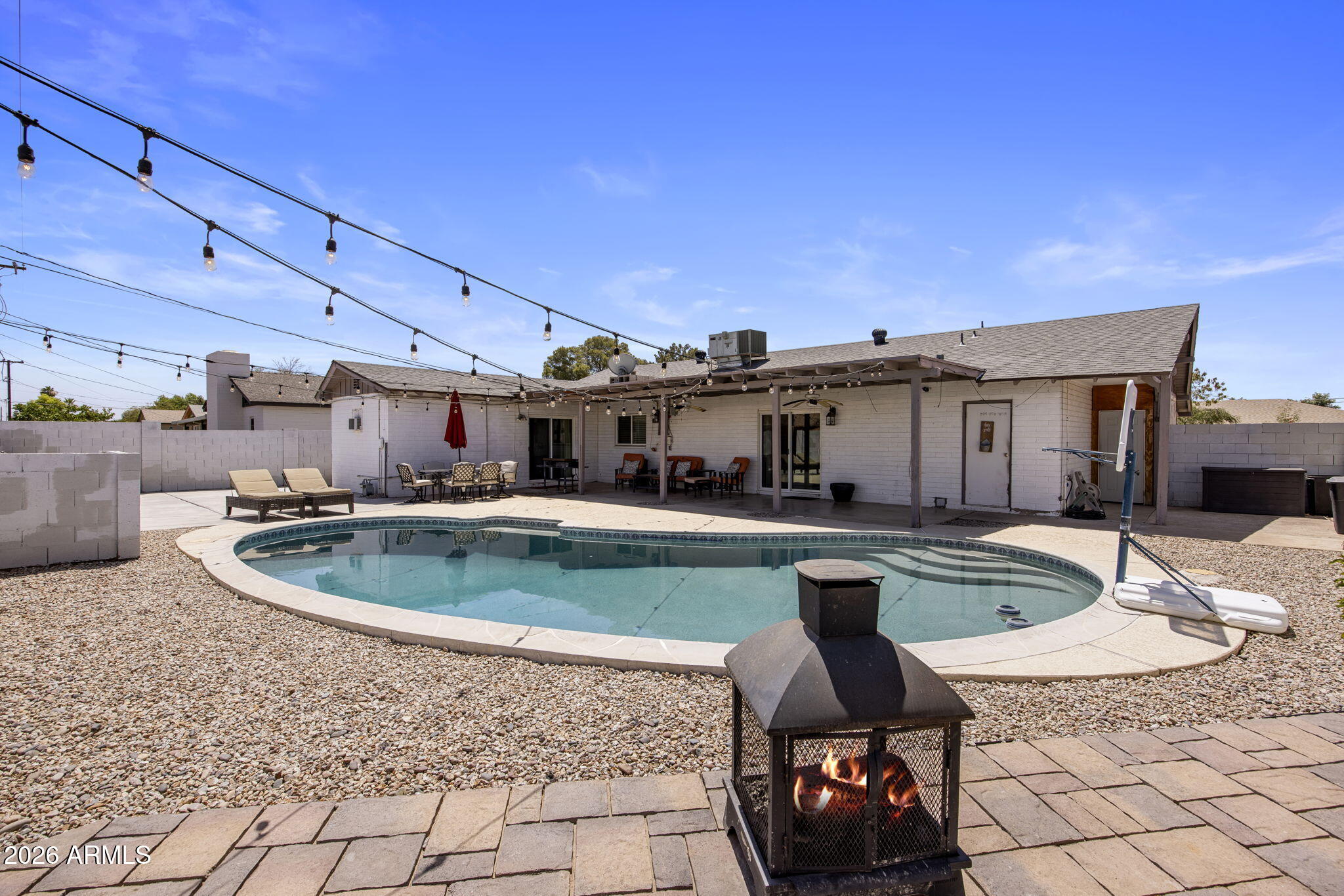 Have you ever wanted to live in the heart of the city? Now you can! This well cared for home has a gourmet kitchen featuring granite counter tops, beautiful cabinetry, stainless steel appliances and island area. Neutral tile flows throughout the kitchen, baths, walkways, bedrooms and family room. The backyard comes with a diving pool, extended covered patio and storage area. And there is No Carpet or HOA!!!! Book your private tour today!