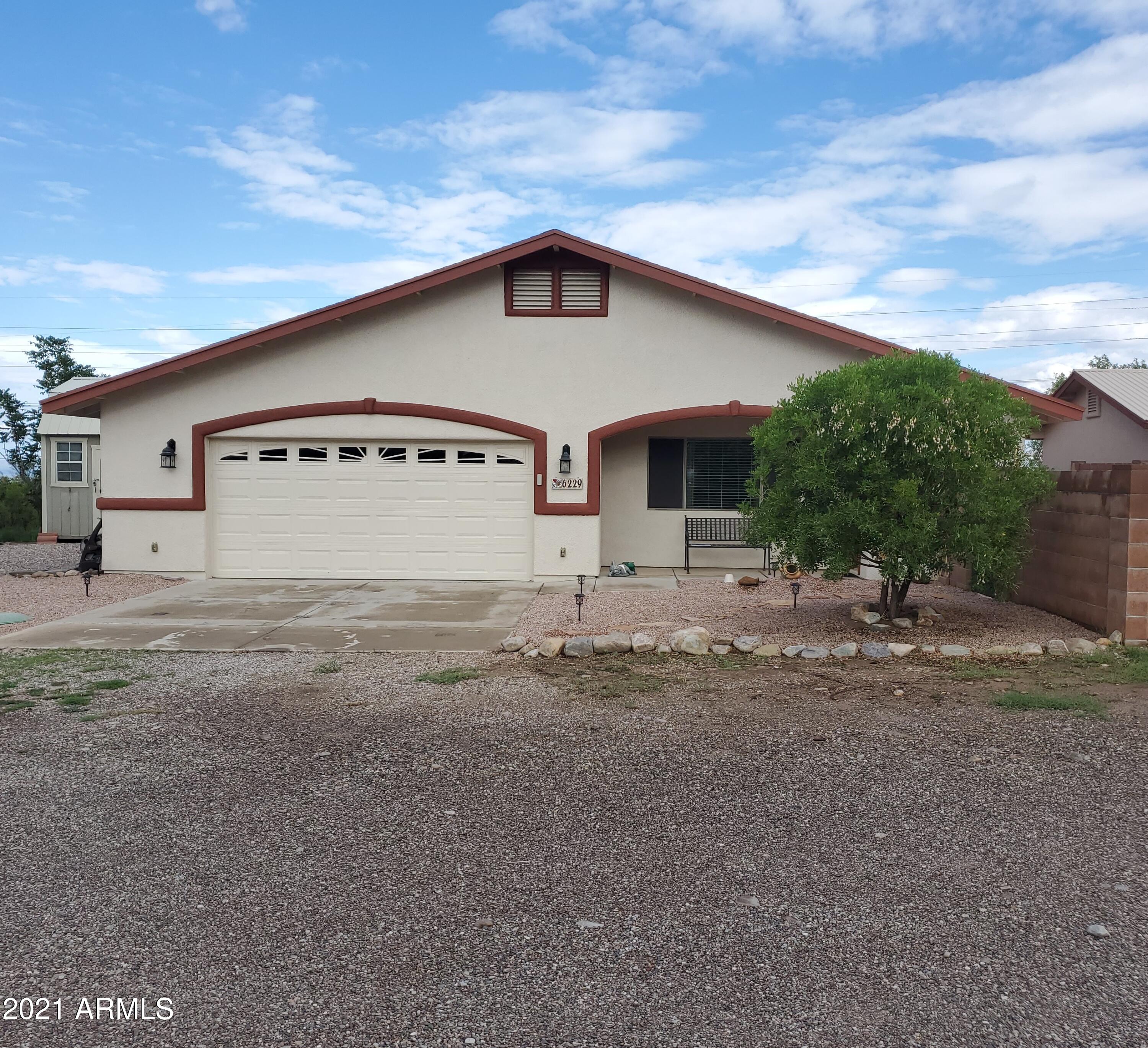 Nice Country Living with Beautiful Mountain Views! This cozy 3 bedroom 2 bath with a garage that is heated and cooled along with a 10 x 12 workshop that is also heated and cooled. Has a Nice screen room on the back to relax, block wall all the way around. The yard has nice decorative rock and some nice palm trees. . Home is all Electric. Also has a water softener. Still has room for RV parking. Please schedule an appointment at least 1hr notice.