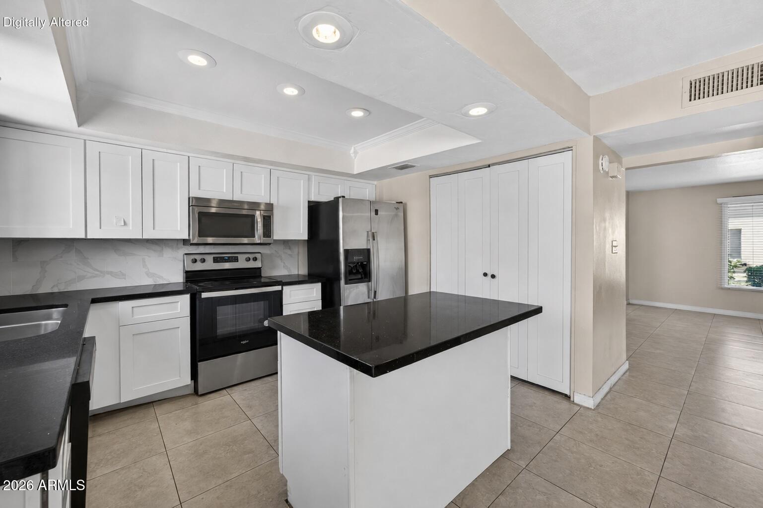 Minutes from Arizona State University and the Mill Avenue district. This NEWER ROOF, NEWER A/C, and NEW WATER HEATER- 2-story townhome offers 1,536 sq ft with 4 bedrooms and 2.5 bathrooms,  All the major components have been handled, that's real peace of mind from day one. Inside you will get a move-in ready feel with tile in the main living areas and vinyl flooring throughout the bedrooms--no carpet anywhere. Updated shaker-style white cabinetry, stainless steel appliances, and a modern backsplash give the kitchen a fresh, finished look. Ceiling fans in every room add comfort throughout.
Whether you're buying to live in or invest, the flexibility is there. Currently tenant-occupied on a month-to-month lease, with tenants open to staying.
If you've been waiting for the right Tempe opportunity at the right price--this is one you don't sit on.