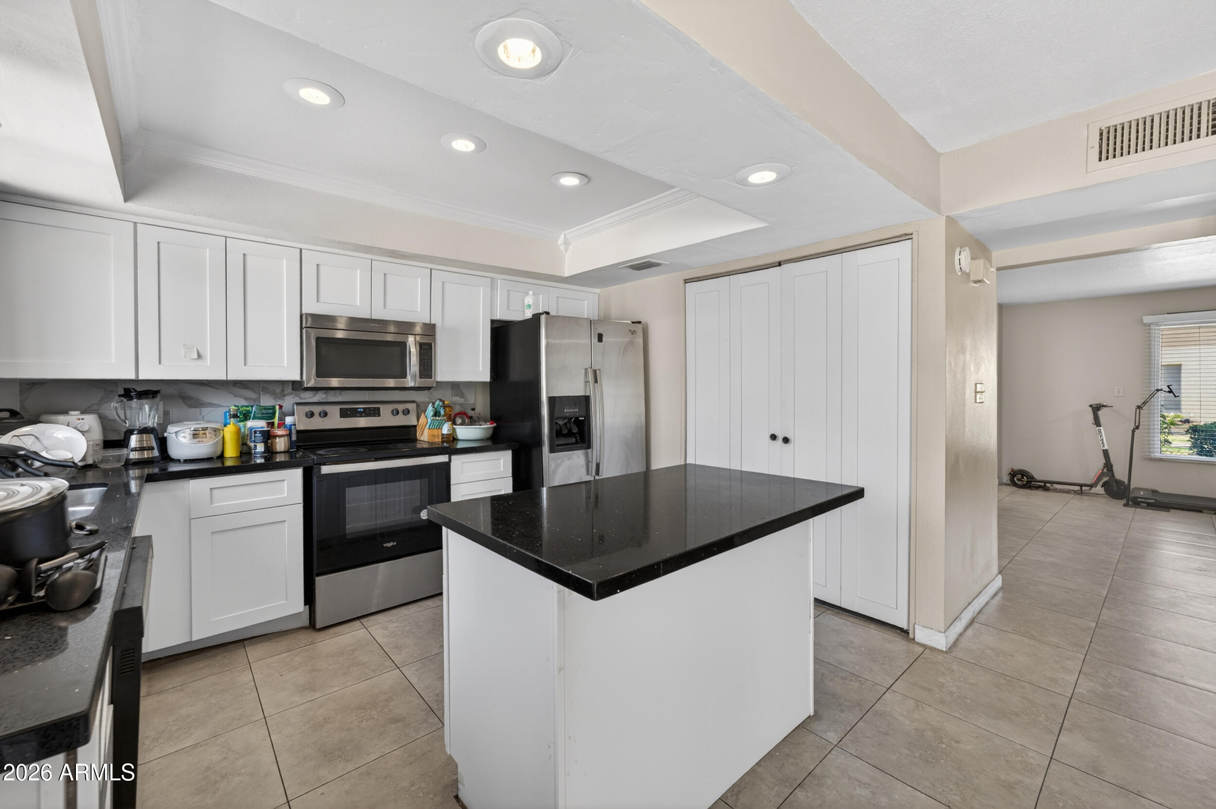 Minutes from Arizona State University and the Mill Avenue district. Finding a 4-bedroom under $350K in TEMPE location is rare!
This 2-story townhome offers 1,536 sq ft with 4 bedrooms and 2.5 bathrooms, NEWER ROOF, NEWER A/C, and NEW WATER HEATER. All the major components have been handled, that's real peace of mind from day one. Inside you will get a move-in ready feel with tile in the main living areas and vinyl flooring throughout the bedrooms--no carpet anywhere. Updated shaker-style white cabinetry, stainless steel appliances, and a modern backsplash give the kitchen a fresh, finished look. Ceiling fans in every room add comfort throughout.
Whether you're buying to live in or invest, the flexibility is there. Currently tenant-occupied on a month-to-month lease, with tenants open to staying.
If you've been waiting for the right Tempe opportunity at the right price--this is one you don't sit on.