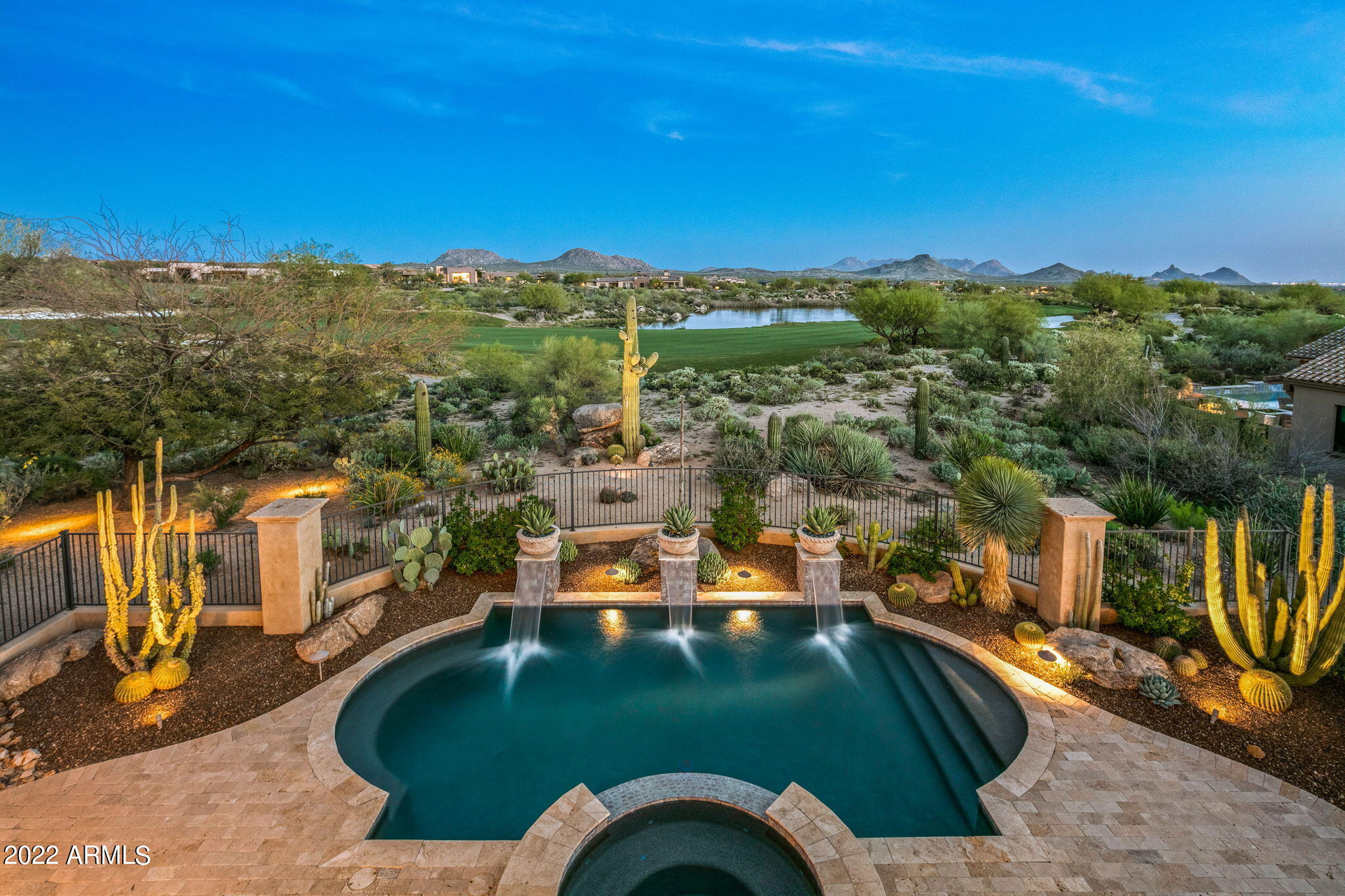 Exquisite custom home situated on one of the best view lots in Mirabel being offered furnished! Take in sweeping golf course, lake, fairway, green complex, mountain & sunset views from the backyard. The views from the view deck are 360 degrees with incredible sunsets and city lights.  This home is appointed with all of the high-end amenities that one would expect in a home of this caliber. Shows like a model home and is in better than new condition. The theater room seats 12 & is tiered for the optimum movie or sports watching experience. It is located at the end of a cul-de-sac on a double fairway and is an easy walk or golf cart ride to the stunning, recently remodeled & expanded Mirabel Desert lodge clubhouse. Contact listing agent for a list of excluded furniture items.