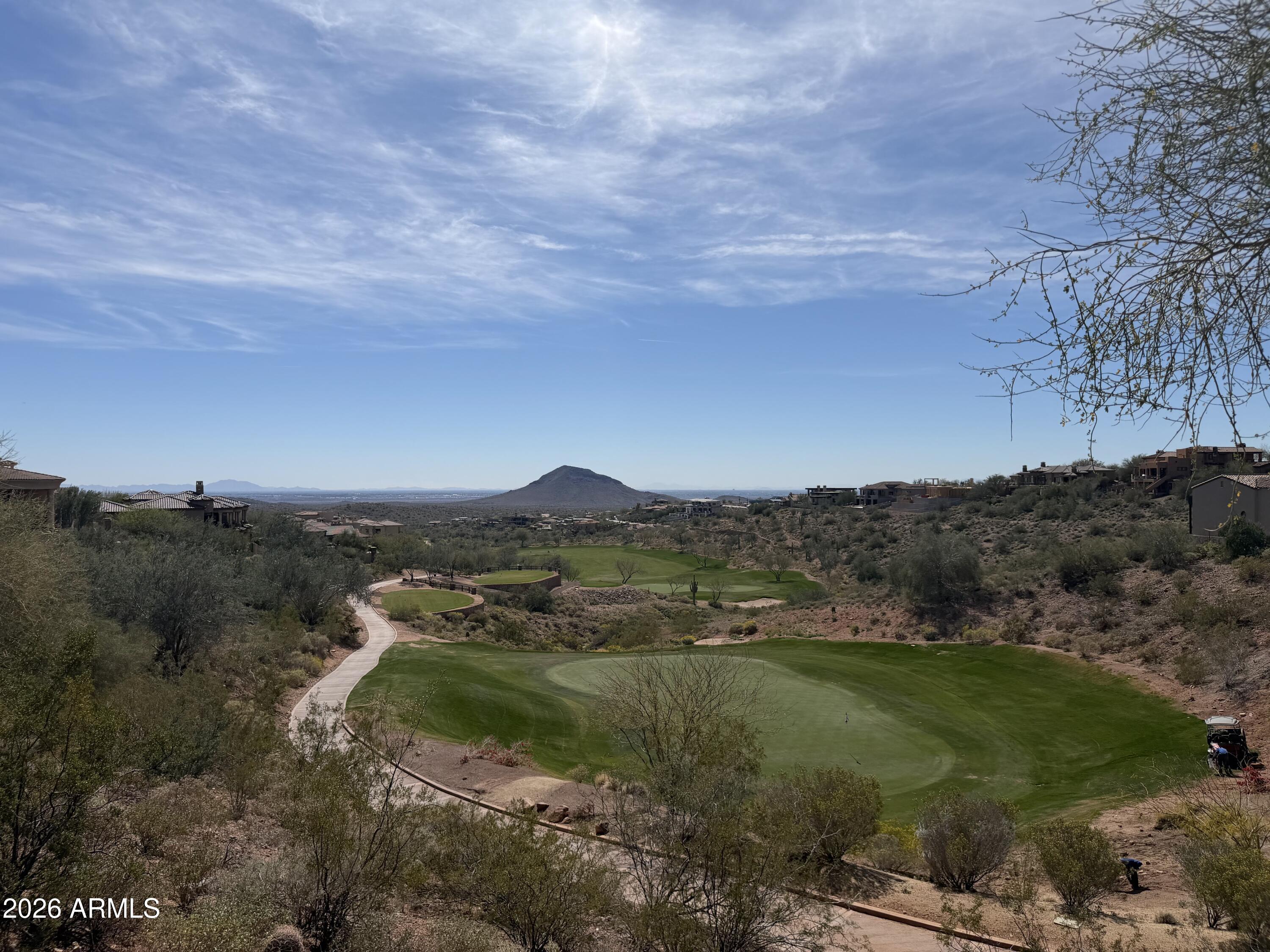 Mountain Views! Incredible opportunity to build your dream home in the prestigious guard-gated FireRock Country Club in Fountain Hills. This upsloping lot offers beautiful north and east mountain views and is perfectly positioned to capture the natural beauty of the Sonoran Desert. FireRock features a championship 18-hole golf course, private country club atmosphere, and stunning custom homes throughout the community. Enjoy peaceful desert living while being just minutes from downtown Fountain Hills, hiking trails, dining, and Scottsdale amenities. A perfect homesite to design and build your custom luxury home in one of Fountain Hills' most sought-after golf communities.