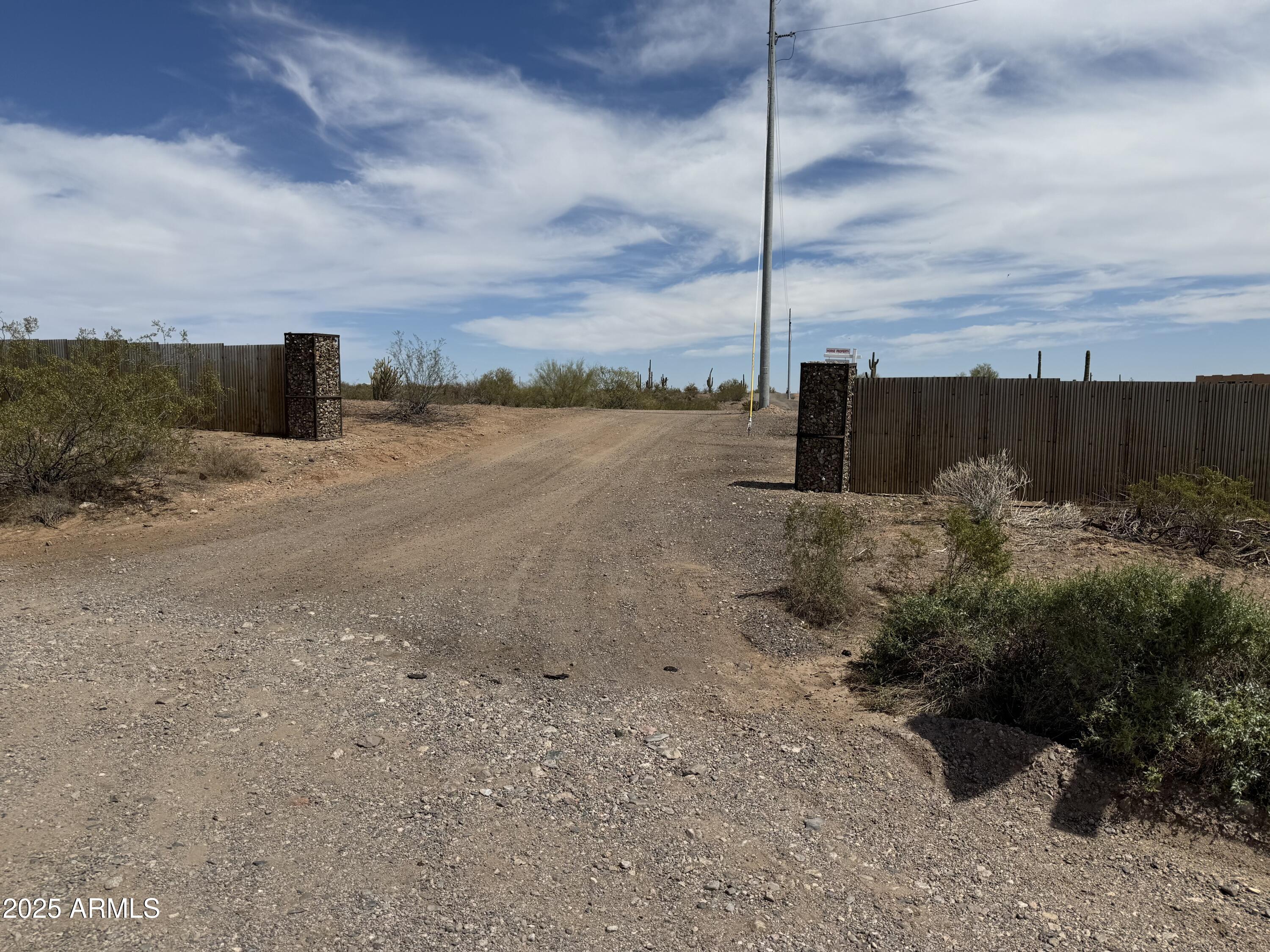 Fantastic 3.93-acre horse property in a great location!! Right off a paved road!! Beautiful mountain views, no flood zone and power is right at the property line. Has a shared well that is on the well. Partially fenced with metal panels and rock pillars, offering security and privacy! Close to arenas and Dillons Restaurant/Bar! Come build your dream horse facility on this beautiful property!