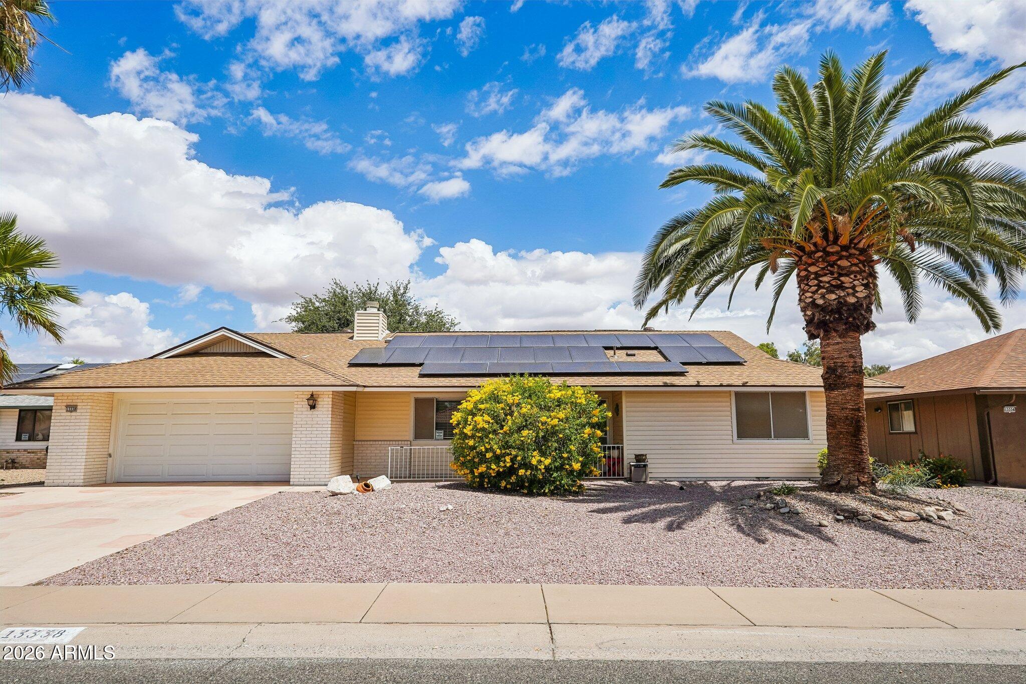 Popular original Kabab/Arroyo model in excellent condition featuring an upgraded kitchen, updated flooring, and an inviting fireplace for added warmth and ambiance. Located on a wide, tree-lined street, this home offers a private fenced backyard perfect for pets, relaxing, or entertaining under the covered patio surrounded by mature trees and landscaping. Aluminum siding panels and efficient solar help improve energy efficiency and reduce utility costs. Enjoy all this plus the outstanding amenities and lifestyle of Sun City West.