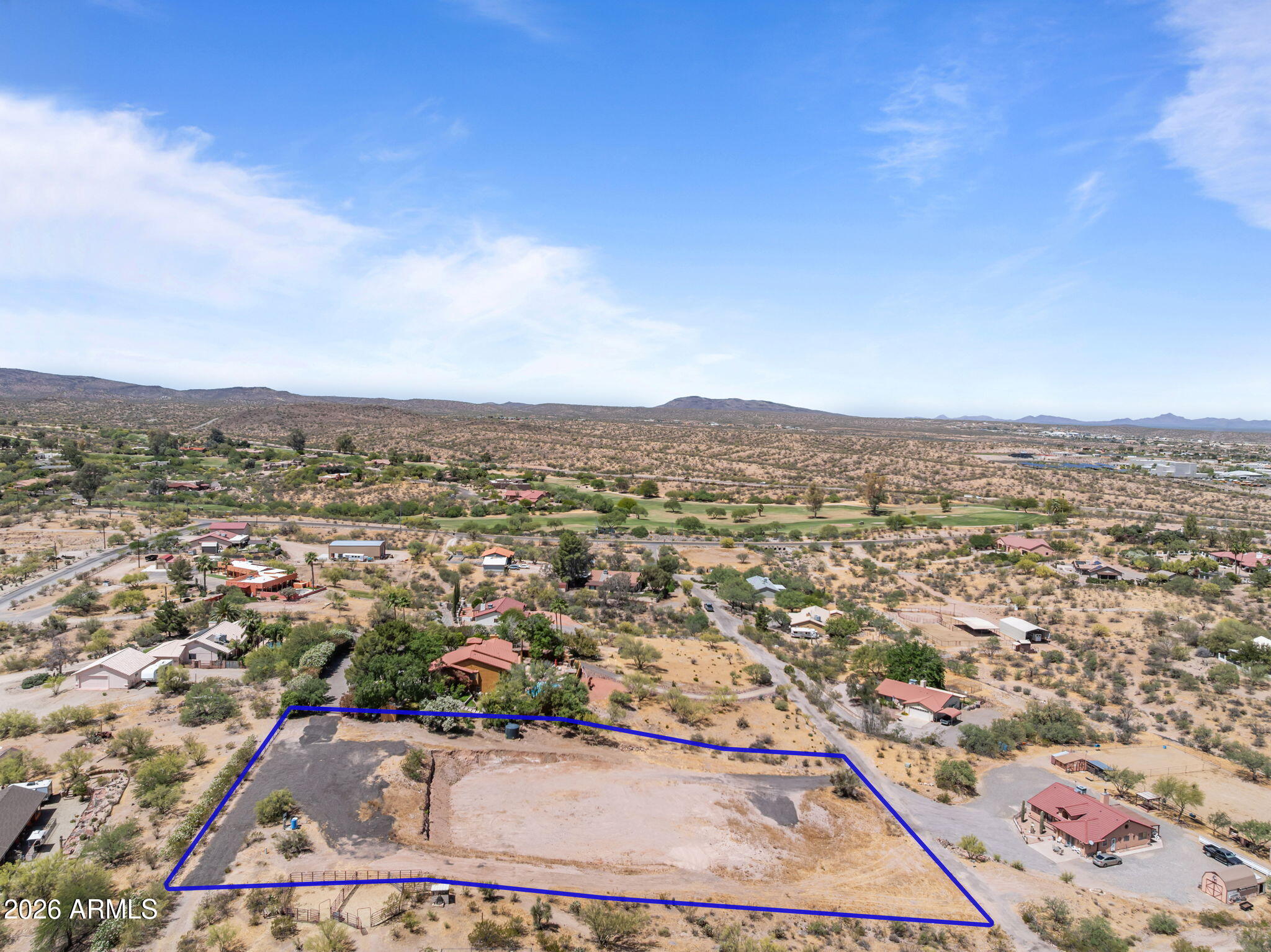 1.33-acre homesite in Wickenburg with stunning mountain views in every direction. Private and quiet setting in a desirable location near Rancho de Los Caballeros with views of the golf course from the property. This sloped hillside parcel features a graded building pad already in place, ideal for a custom home with potential for a walk-out basement design. Power and water are on site, plus a shared well with only two neighboring parcels. Paved road access adds convenience, while nearby state land offers ATV riding, horseback riding, hiking, and outdoor recreation. Conveniently located near schools, shopping, and town amenities. A rare opportunity to build your custom Arizona retreat.