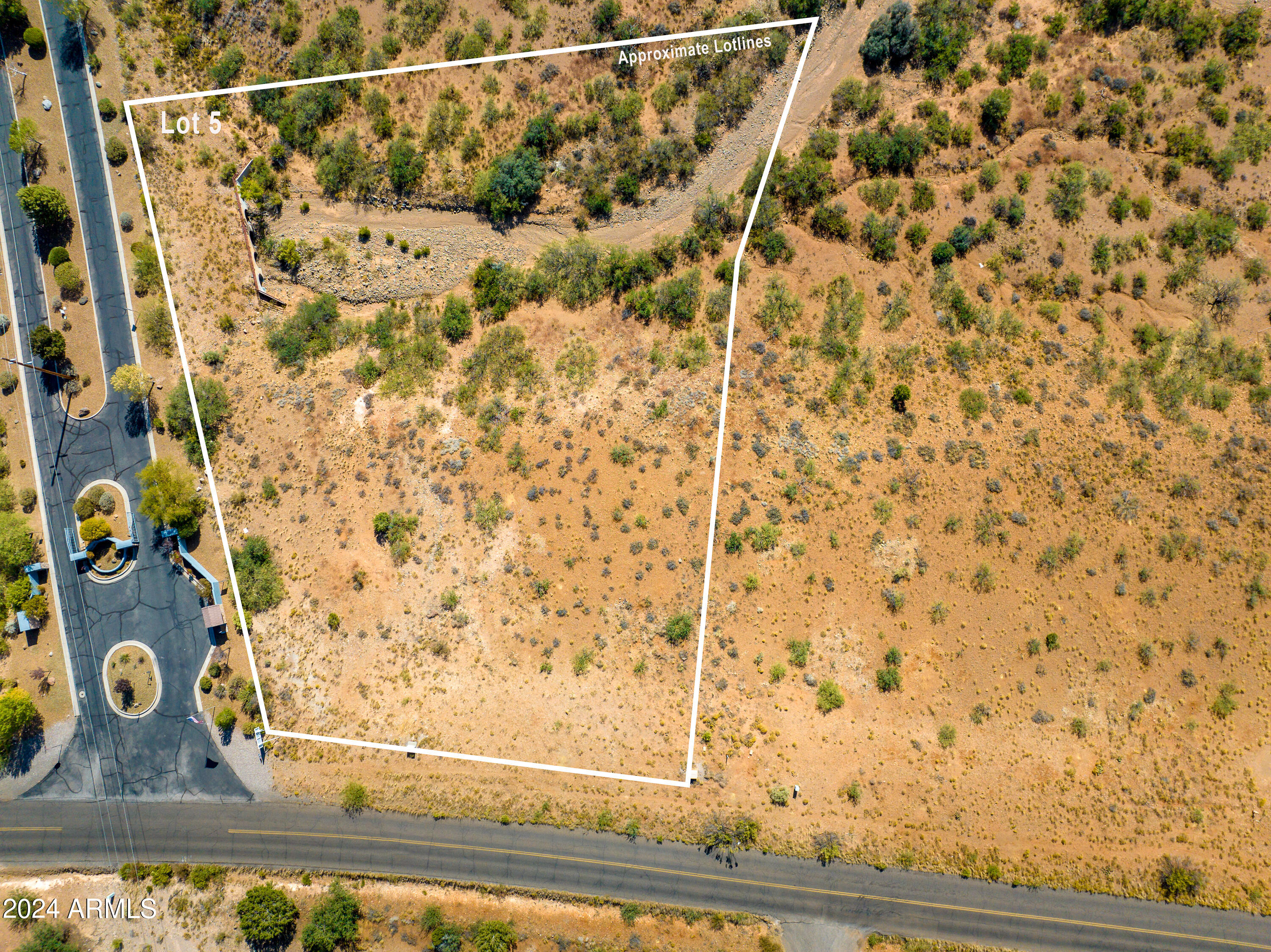Buy and hold-or-Buy and build! Amazing location. Incredible views of Mingus Mt. & Red Rocks of Sedona! Prestigious Quail Canyon Estates just minutes away from Sedona, Old Town, wine country, This 1.65 acre lot features natural high desert landscaping and easy access! Ask about land/home packages offered through Lawler Construction (voted Verde Valley's BEST Builder)