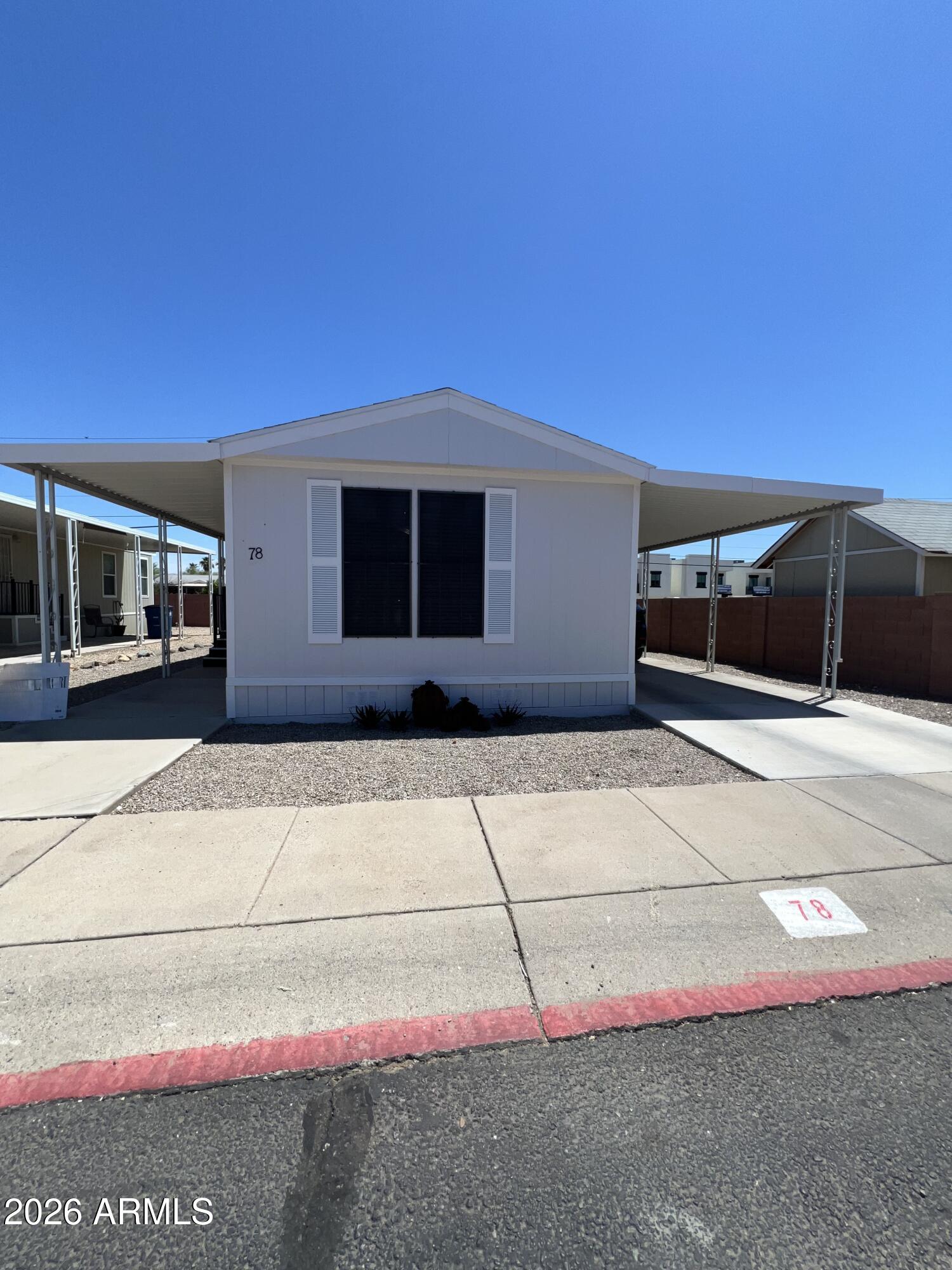 Beautifully updated 3-bedroom, 2-bath home in one of the area's most sought-after family communities. Residents enjoy a community pool, playground, basketball court, dog park, and exceptionally maintained grounds.
Recent updates include NEW exterior paint (2026), roof (2023), luxury vinyl plank flooring throughout (2023), and remodeled bathrooms (2024). The split floor plan offers privacy, with a spacious primary suite featuring a large tiled walk-in shower and private water closet. Two secondary bedrooms share an updated Jack-and-Jill bath with new tub and surround.
Enjoy two large, covered decks, a fenced yard, ADA-height toilets, professionally cleaned air ducts and vents. Move-in ready with thoughtful updates throughout! Park approval required. Mobile home lender financing is availab