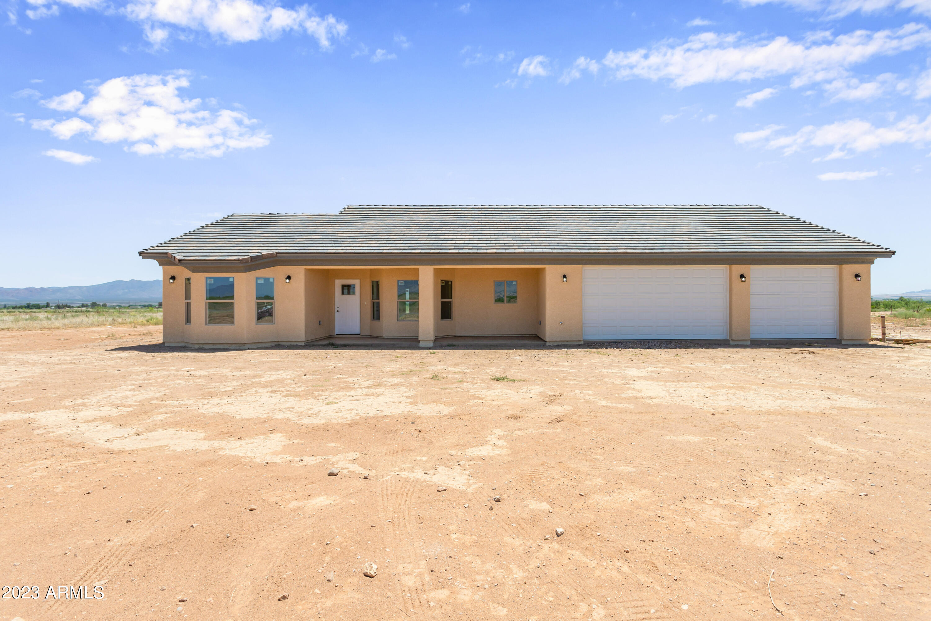 New constructed house in the finishing stages waiting for your buyer to fall in love! 3 bedroom /3 bathrooms - primary bedroom has HIS and HERS separated bathrooms attached. 3 car garage. Sitting on 3.3 acres backing up to county land. Located in the new gorgeous subdivision of Rancho Arizona with views at every angle. Come take a look and see for yourself it is your perfect new home!