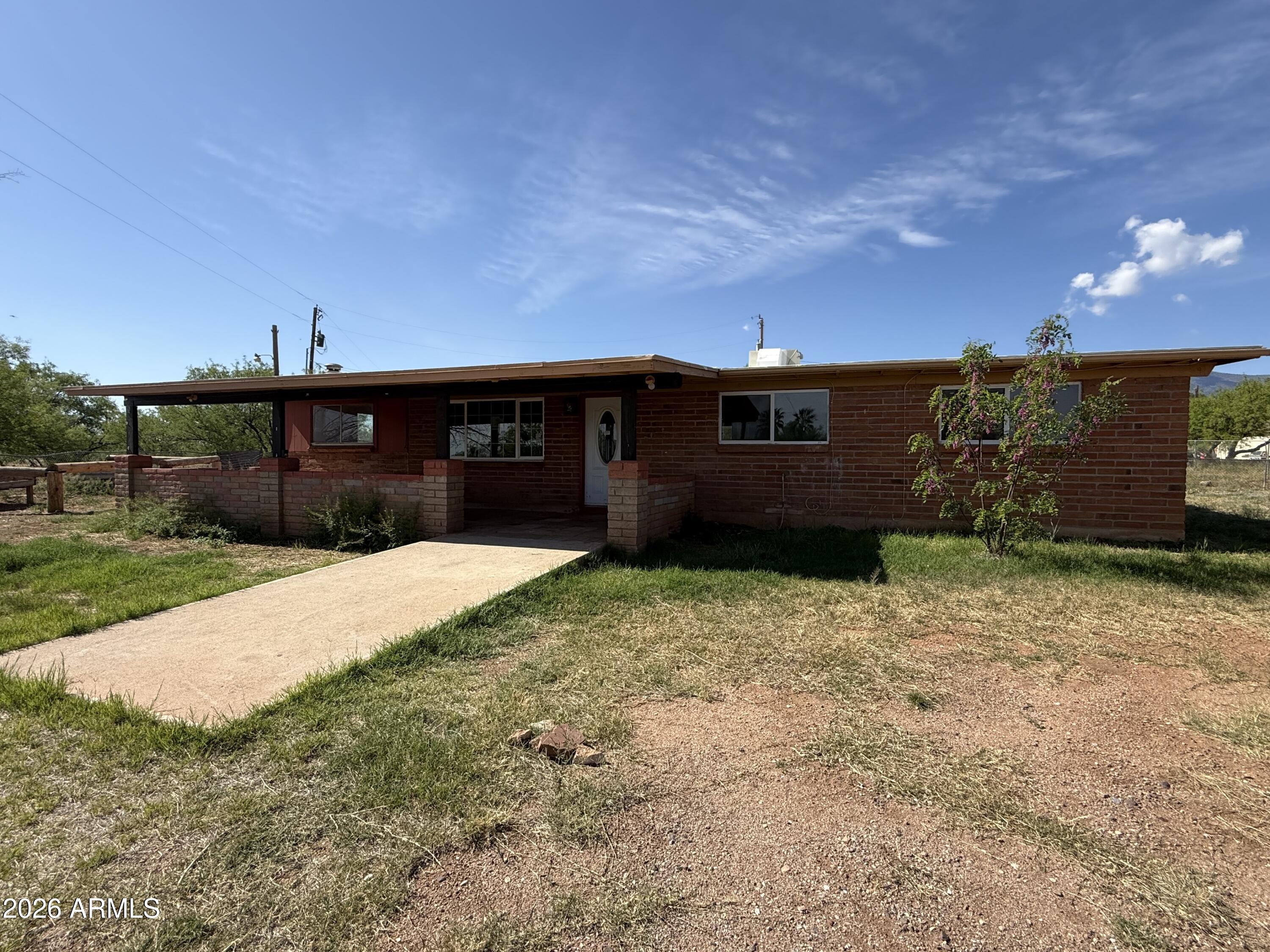 This cute home is just waiting for new owners! The home features a living AND family room, large utility room and 3 bedrooms! There are 2 walk in closets. There were recent updates inside. Newer flooring as well. There is a fenced back yard as well as fencing beyond that in the back. Do not miss this great opportunity!