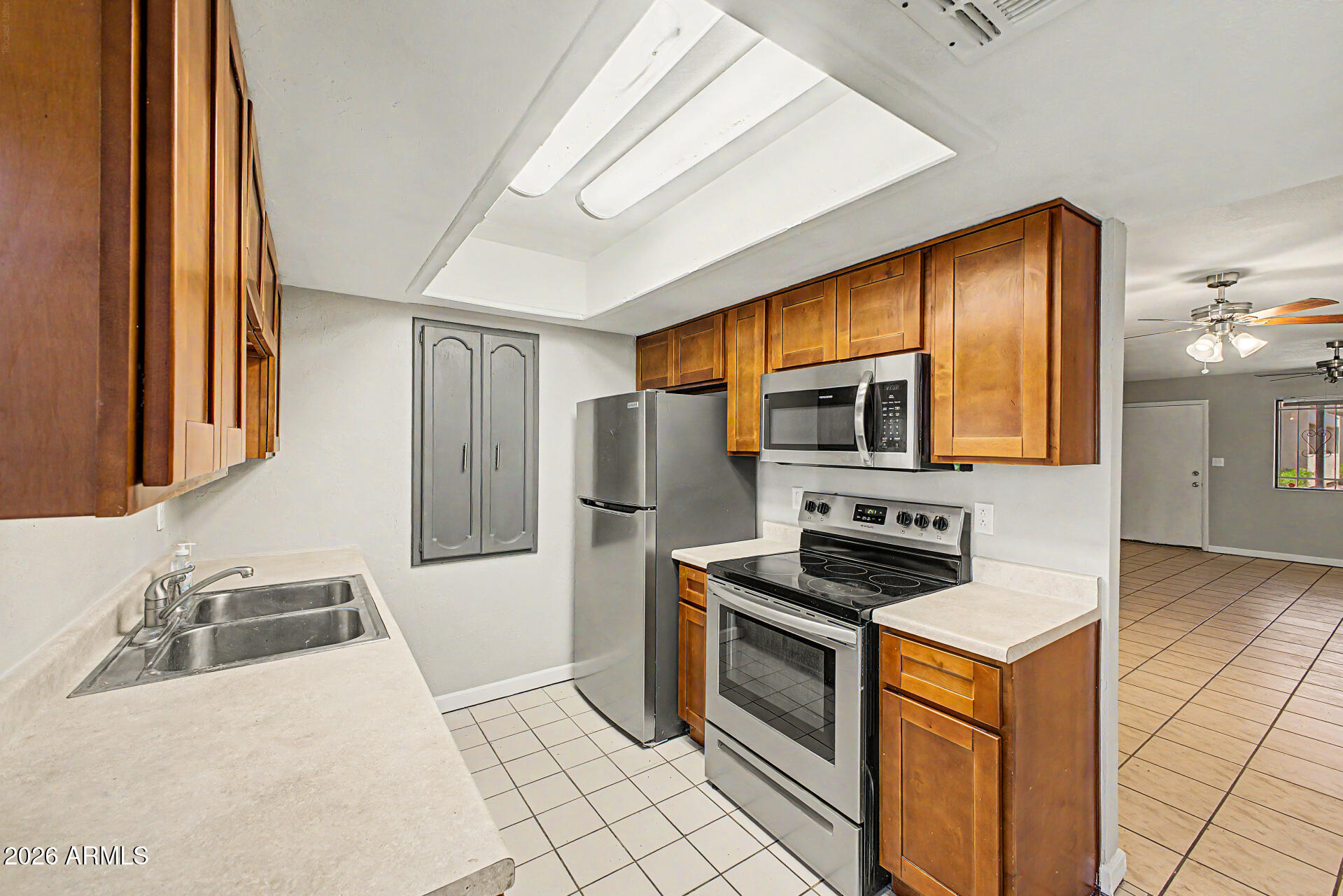 LOOK AT THIS PRICE! Prime Arcadia Lite ground-floor condo in a central Phoenix location! This bottom-floor, single-level unit offers easy access with no stairs and a true lock-and-leave lifestyle. Located in a gated community with pool, spa, and lush green spaces. Minutes to Arcadia, the Biltmore, Downtown Phoenix, and SR-51 for easy commuting. Close proximity to hotspots like La Grande Orange Grocery & Pizzeria, Postino Arcadia, The Vig Arcadia, and The Henry. Close to major employers including Banner Health, Dignity Health, Arizona State University, and the Phoenix Children's Hospital. Ideal for first-time buyers, investors, or a low-maintenance second home with strong rental appeal in one of Phoenix's most connected neighborhoods.