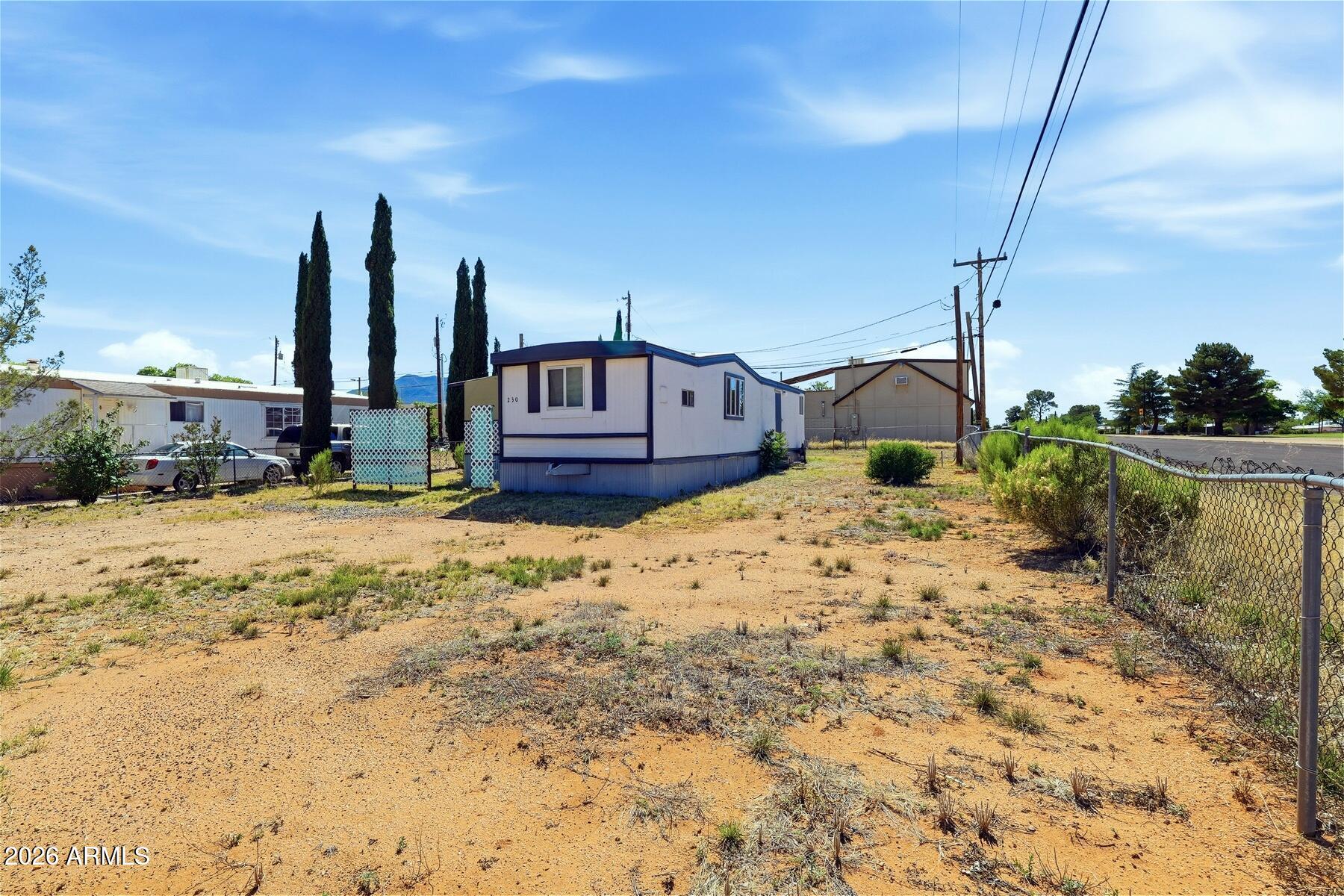 Affordability is here with this 1969 2 bed 1 bath manufactured home on a Large Corner Lot directly across the street from Len Roberts Park in Sierra Vista.  Owner may Carry.