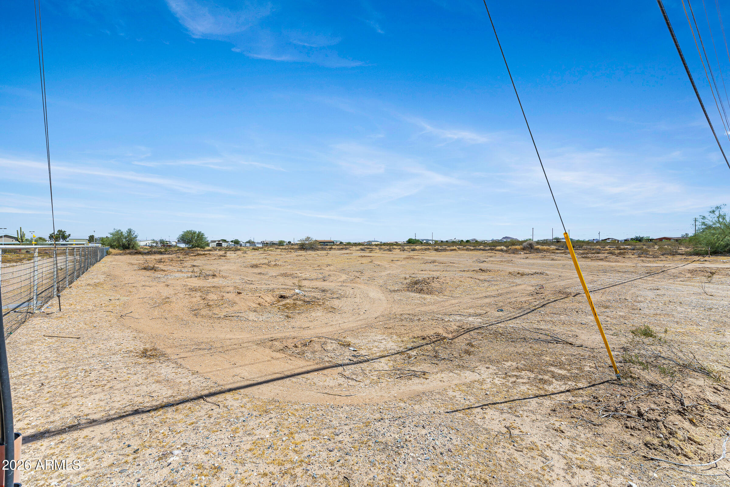 PRICED AGGRESSIVELY FOR AN IMMEDIATE CASH SALE!
This 4.22-acre custom estate site in San Tan Ranches is your ultimate blank canvas. The lot is meticulously cleared of brush, revealing flat, highly buildable terrain ready for your foundation (aerial photos show pre-cleared lot; ground photos reflect current cleared condition).
Crucial infrastructure is ready: electric is at the property line, and a boundary survey is complete.
Zoned SR (Rural Residential) with NO HOA, offering total freedom to build a luxury home, equestrian facility, or private ranch. Start your 4-acre sanctuary today! Cash or hard money preferred for a fast close