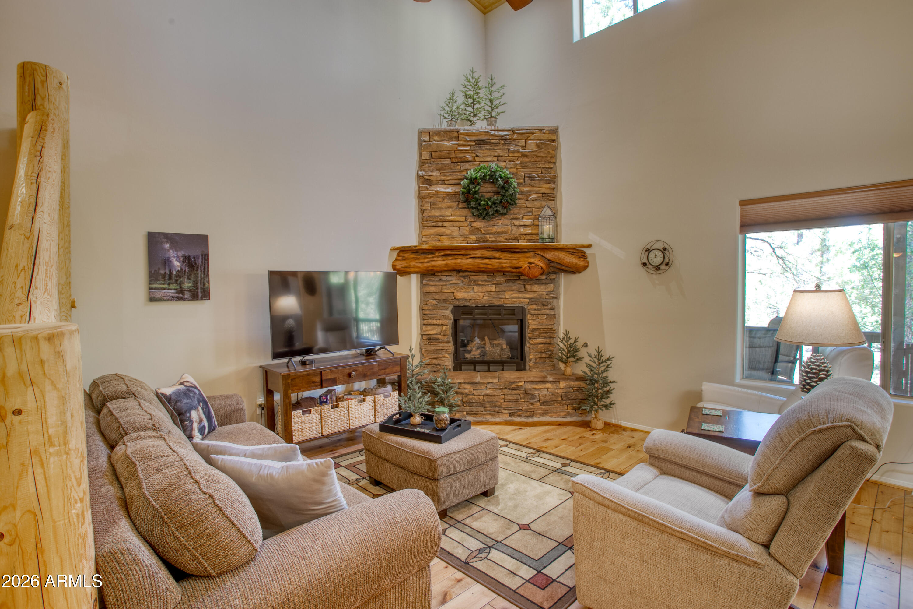 Experience the best of mountain living in this beautifully updated townhome in desirable Starlight Ridge Estates. Featuring an open, light-filled floor plan with soaring vaulted ceilings and a cozy gas fireplace, this home offers the perfect blend of comfort and style. The kitchen has been beautifully refreshed with new granite countertops and all-new stainless steel appliances, making it ideal for both everyday living and entertaining. Both bathrooms feature new granite countertops, and the primary bathroom has been completely remodeled, showcasing a stunning custom-tiled walk-in shower that creates a spa-like retreat. The spacious primary suite offers privacy and comfort, while the guest bedroom provides plenty of room for family and friends. Step outside to the covered patio and enjoy the peaceful setting beneath the towering pines.

An attached garage provides added convenience, and the home is being sold fully furnished, allowing you to move right in and start enjoying the White Mountains immediately.

Ideally located just minutes from shopping, dining, golf, fishing, hiking, and year-round recreation, this move-in-ready home is perfect as a full-time residence, vacation getaway, or investment property. Don't miss this opportunity to own a beautifully updated mountain retreat in the heart of Lakeside.