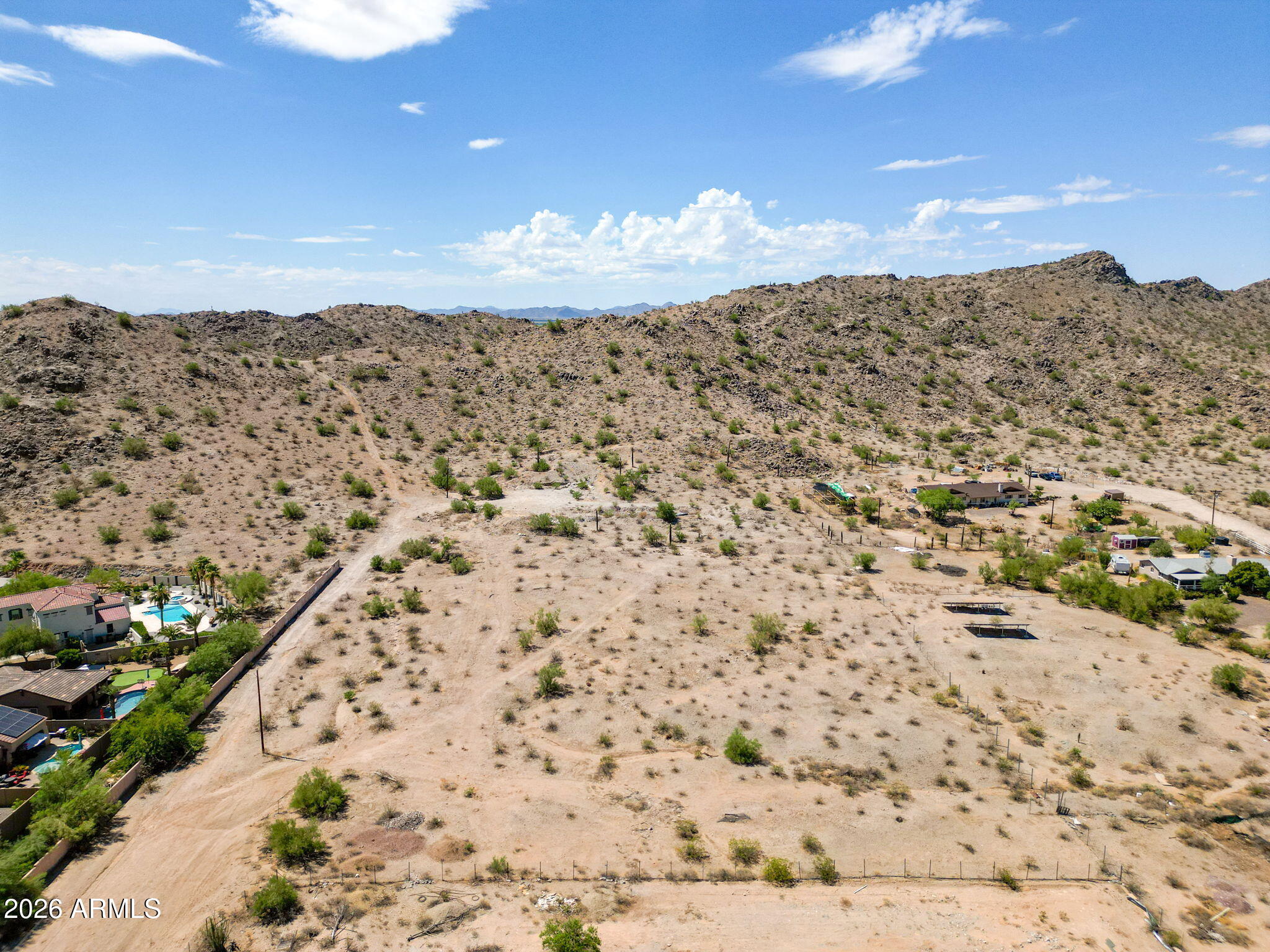 Beautiful opportunity to own two adjoining 2.5-acre parcels being sold together for approximately 5 total acres in Buckeye, AZ (APNs 400-53-150 & 400-53-151). Property features power, well, and a partial foundation already started, providing a head start toward future development. Enjoy stunning desert and mountain views, wide-open space, and endless possibilities for a custom home, 
ranch property, private retreat, or investment opportunity. Experience peaceful Arizona living with room to grow while still being within reach of nearby amenities.
Seller financing/carryback may be available for qualified buyers, creating additional flexibility and opportunity for future ownership
Reference MLS: 7032125 and 7032117