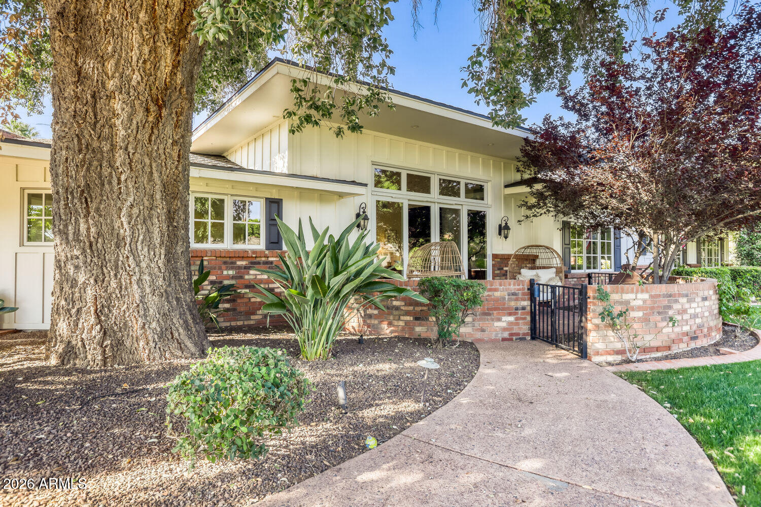 Location, privacy, and perfection! Tucked at the end of a quiet cul-de-sac off the tree-lined Lawrence Rd, this meticulously maintained estate defines pride of ownership. Designed for elite entertaining, the home features 3 sets of glass sliders opening to a resort-style backyard with a salt pool, rock waterfall, fire pit, and outdoor kitchen with misters. Inside, enjoy a luxury primary suite with a steam shower, custom vanities, and dual walk-in closets. Highlights include an indoor & outdoor bar, media room, a versatile, separate-entry bedroom & full bath -- perfect for an in-law suite/home gym/home office, 3-car garage, and diving pool. From the tree-lined entry to the custom-built-ins, every detail was done right the first time. A true must-see property for the discerning buyer!