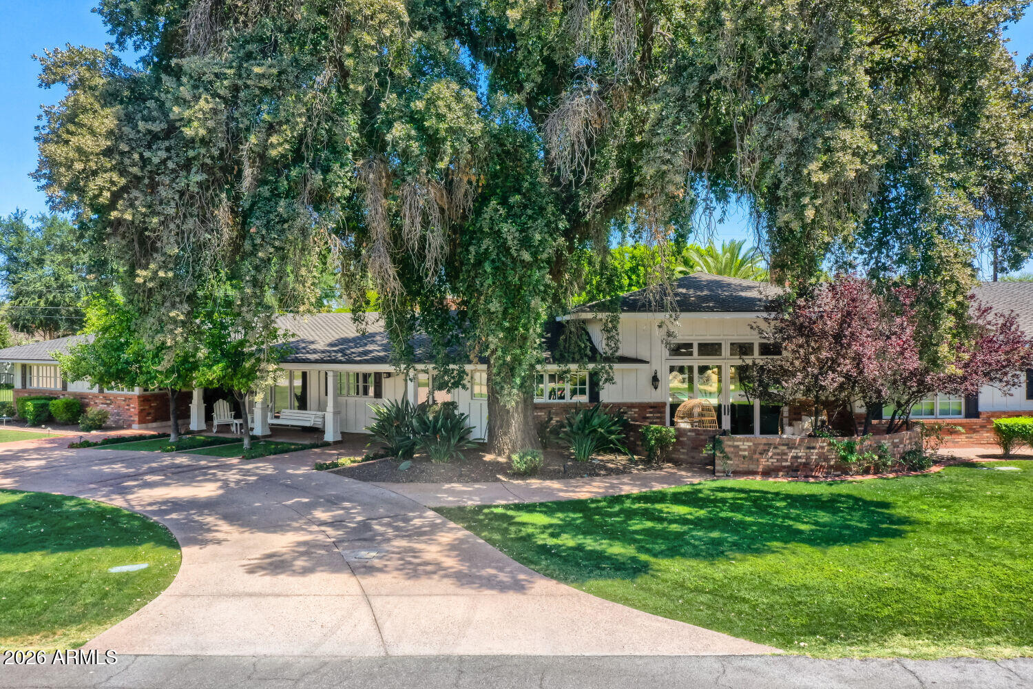 Location, privacy, and perfection! Tucked at the end of a quiet cul-de-sac off the tree-lined Lawrence Rd, this meticulously maintained estate defines pride of ownership. Designed for elite entertaining, the home features 3 sets of glass sliders opening to a resort-style backyard with a salt pool, rock waterfall, fire pit, and outdoor kitchen with misters. Inside, enjoy a luxury primary suite with a steam shower, custom vanities, and dual walk-in closets. Highlights include an indoor & outdoor bar, media room, a versatile, separate-entry bedroom & full bath -- perfect for an in-law suite/home gym/home office, 3-car garage, and diving pool. From the tree-lined entry to the custom-built-ins, every detail was done right the first time. A true must-see property for the discerning buyer!