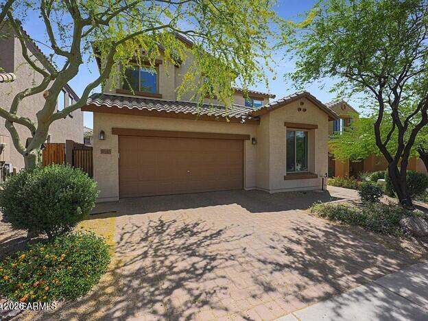 Don't miss this beautiful home in a highly sought after neighborhood.  Great family friendly neighborhood located steps away from a neighborhood park.  This home is the largest floor plan in the neighborhood, with updated lighting, tile, and wood in all the right places.  Step into your formal dining room for family dinners in a setting accented by 360 degrees of custom crown molding.  A lower-level guest suite with adjacent bath & shower.  The wonderful chef's kitchen has granite countertops, a center island/breakfast bar & a large number of cabinets!  Upstairs has a roomy loft perfect for a media room or playroom.  All bedrooms have ceiling fans.  The spacious master has a private en-suite with double sinks, oversized tub and a roomy walk in closet.