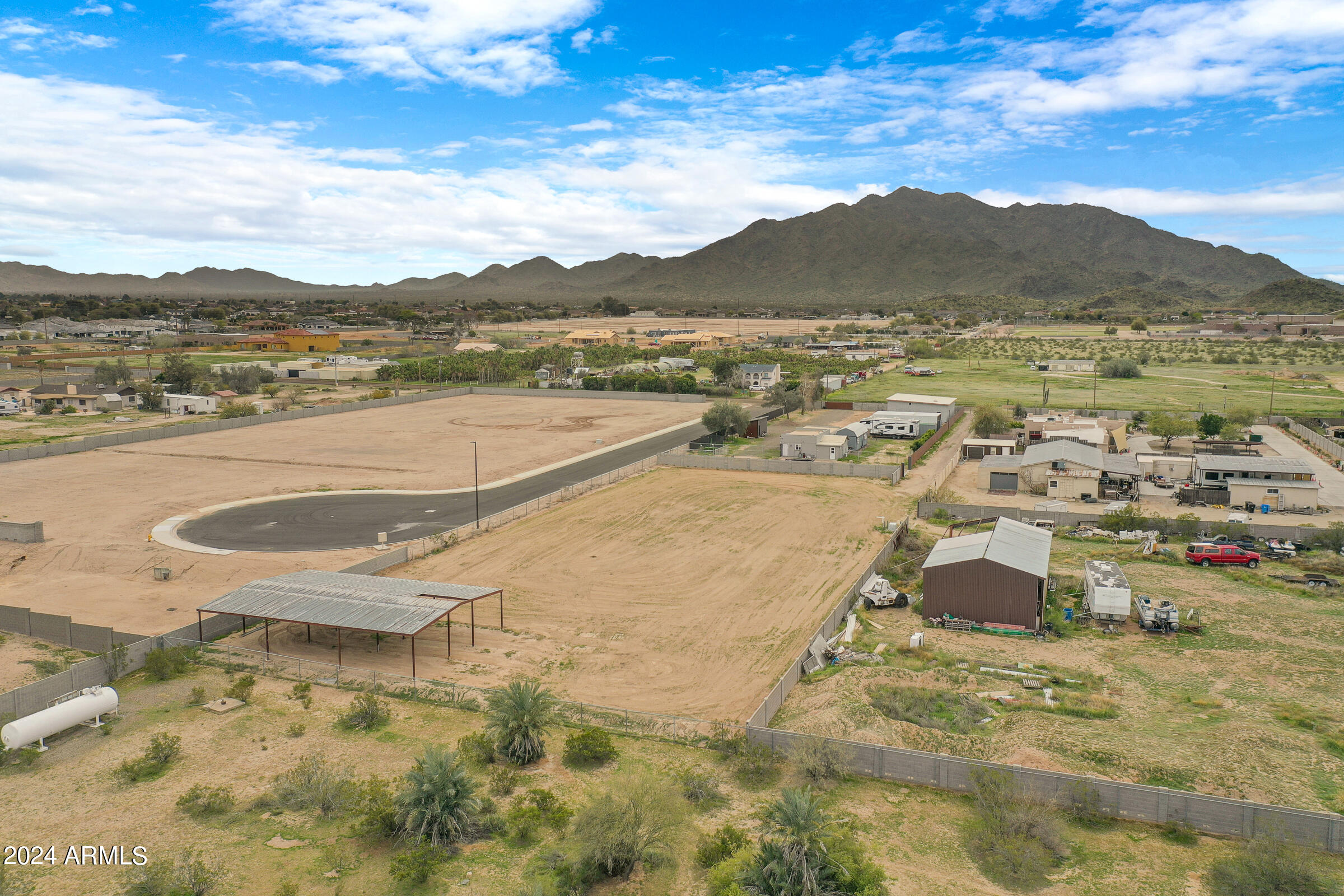 This horse property is perfect for folks who want to be in the city but have space for your toys, and NO HOA!! Very Private and easy access- Great views of San Tan Mountains- Electric is on the property, share well is ready & put in a septic system--  Mews will be paved by the city by end of 2025  Hurry and come by and see it-- they are not making any more land- so put your offer in, you will be glad you did!