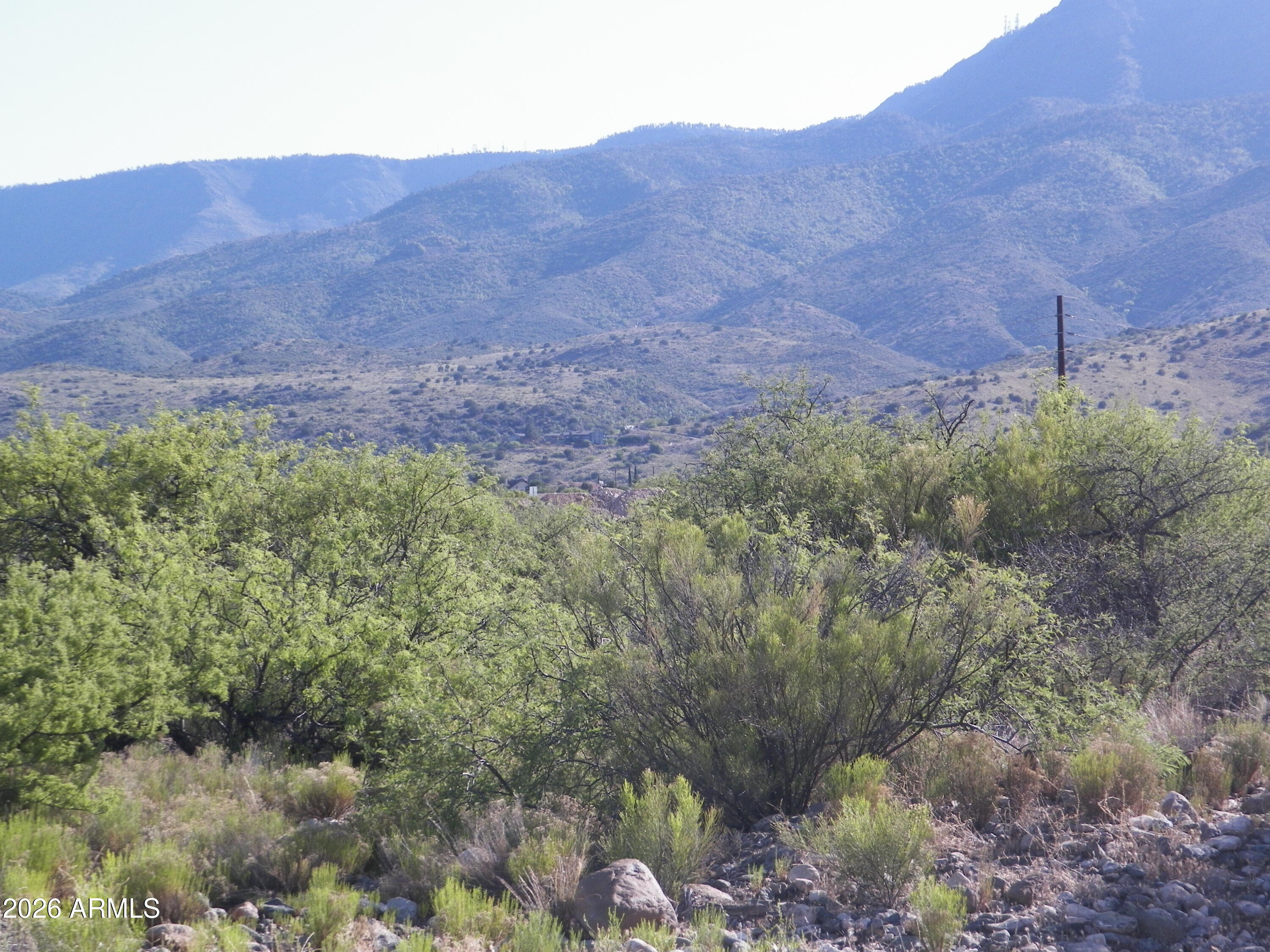 The Crossroads at Mingus is a Multi-Use Planned Area Community located in the historic Town of Clarkdale, AZ.  Nestled on the side of Mingus Mountain surrounded by majestic views, yet close to local amenities, Yavapai College hospital, recreation center, Shopping restaurants, Verde River, and several local parks, and so much more! Enjoy our 2 parks, Copper Penny Park has a pickleball court, children's playground, barbecue pits, and Skyline Park with 360-degree views of the Verde Valley!  Enjoy the subdivision trail!  From our location, you are approx. 5 to 28 minutes to the 7 towns located in this beautiful river basin valley.   This nice central location is hard to beat! Here at the Crossroads at Mingus, you can use our builder of choice (Jamison Builders) or choose your own builder.