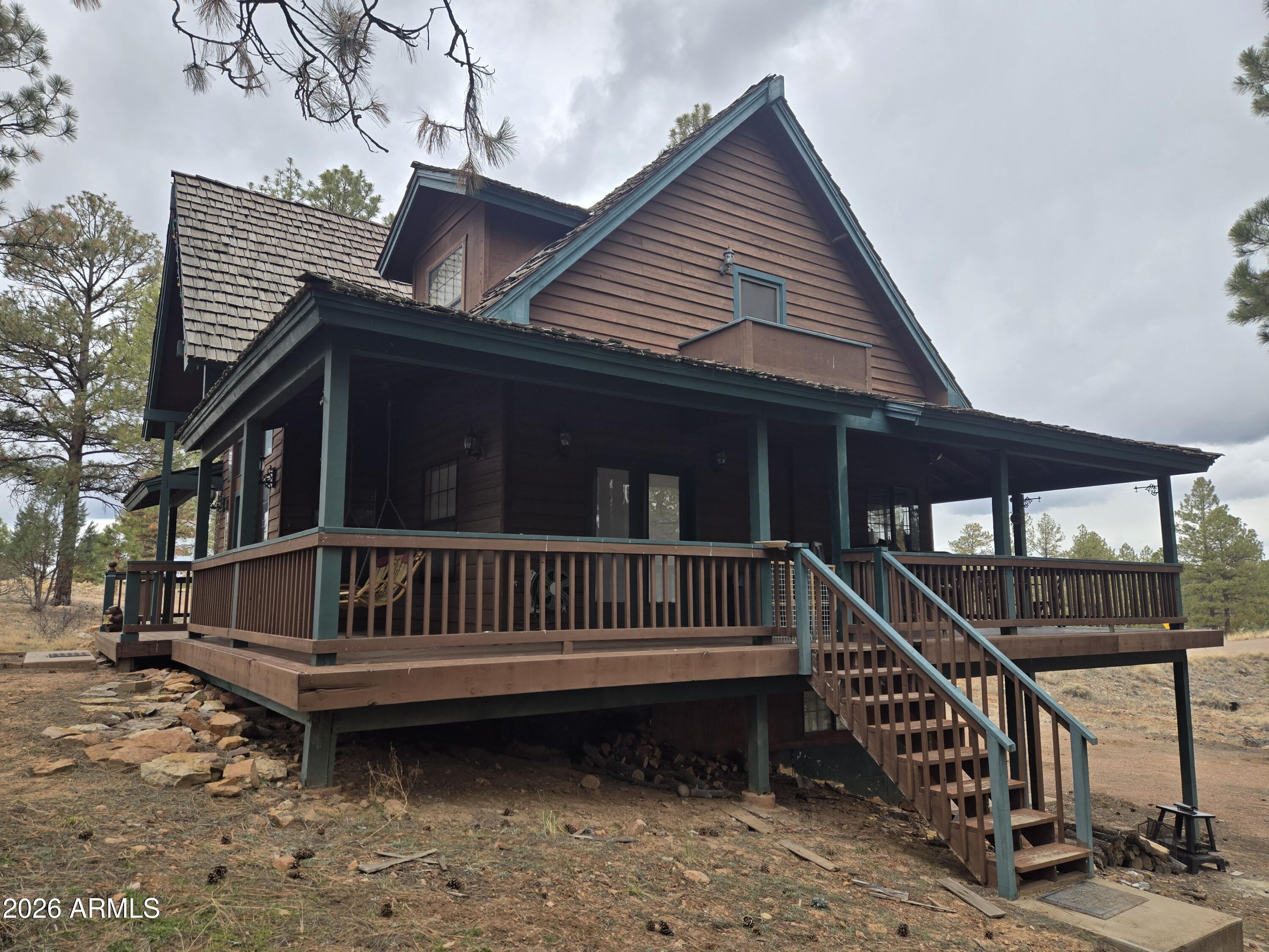 Spacious, quiet cabin nestled in the heart of the Heber-Overgaard area!  Get that rural, woodsy feeling, while still finding your home on groomed roads for year-round enjoyment.  The bedrooms are spread across three floors, with full bathrooms on each floor.  The balcony spans two sides of the home allowing for plenty of space for enjoyment.  The home also features a single car garage for storage of your winter toys or parking.  Conveniently located to all the amenities of town.  This home may be sold furnished.