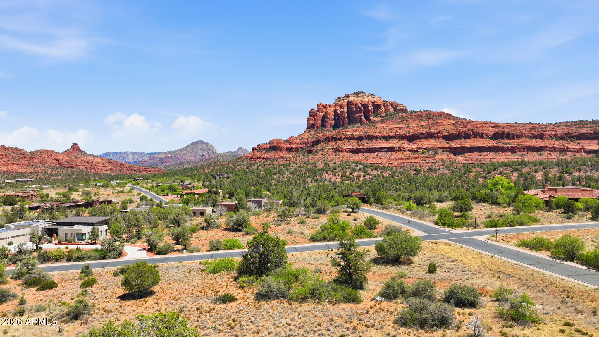 Situated on a quiet cul-de-sac on Cathedral Ranch Drive, this breathtaking 1.539 acre property offers a level, buildable area with unobstructed panoramic views of Cathedral Rock and Seven Warriors.
Surrounded by rolling hills and stunning natural scenery, this lot provides the perfect setting to build your dream home immersed in nature. Phase 1 requires a minimum home size of 2,100 sq. ft., though the lot can easily accommodate a much larger custom residence.
Approximately 32% of the property is designated as buildable area, with the remaining portion preserved as Natural Open Space (NAOS) in accordance with the community design guidelines. Cathedral Rock Ranch is known for its architecturally stunning homes that blend seamlessly, preserving the beauty and of the area. 
CC&Rs are availa